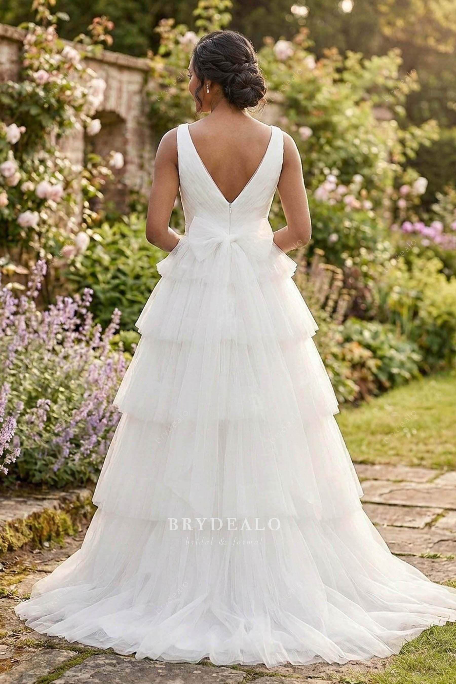V-back tiered tulle wedding dress