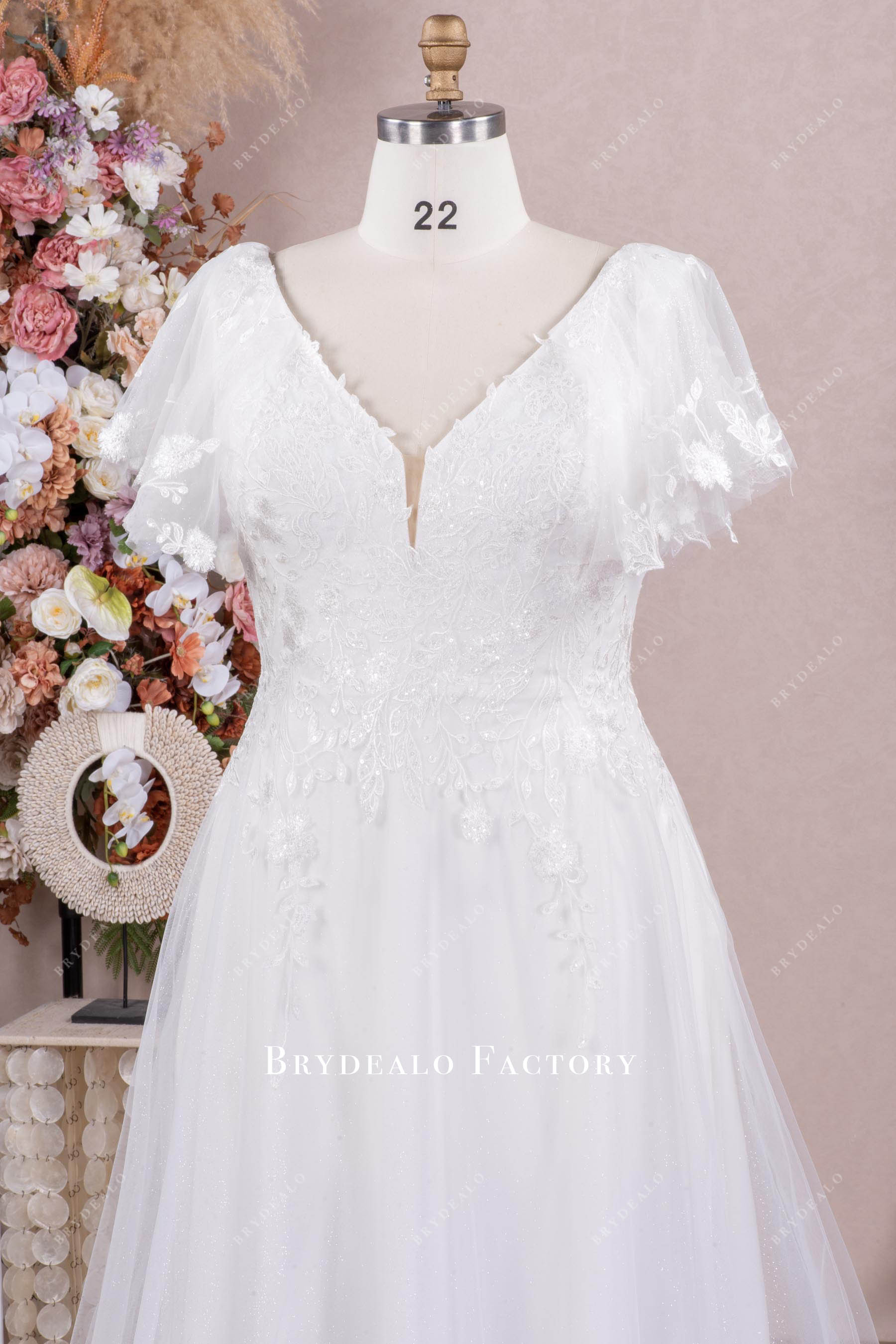 V-neck lace flutter sleeve bridal gown