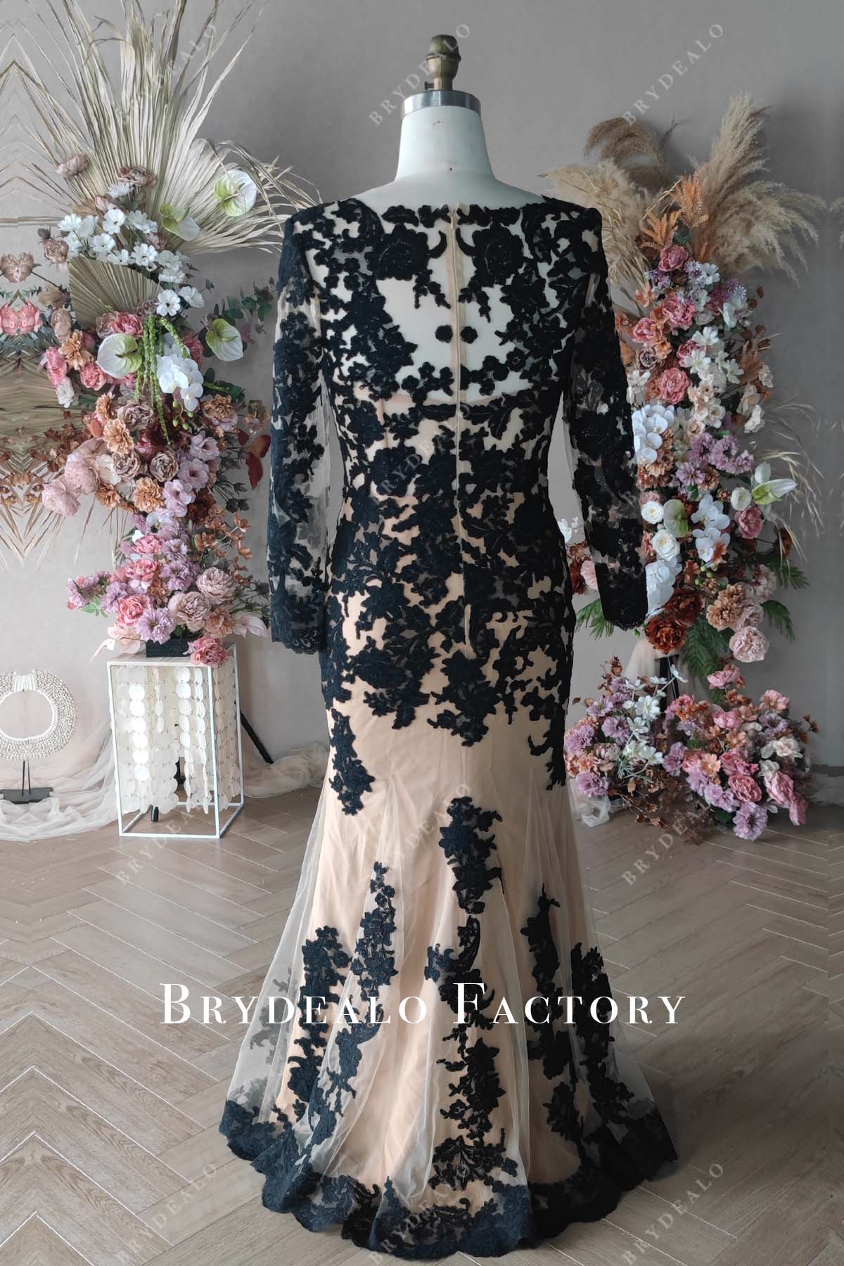 black lace floor length fit and flare gown