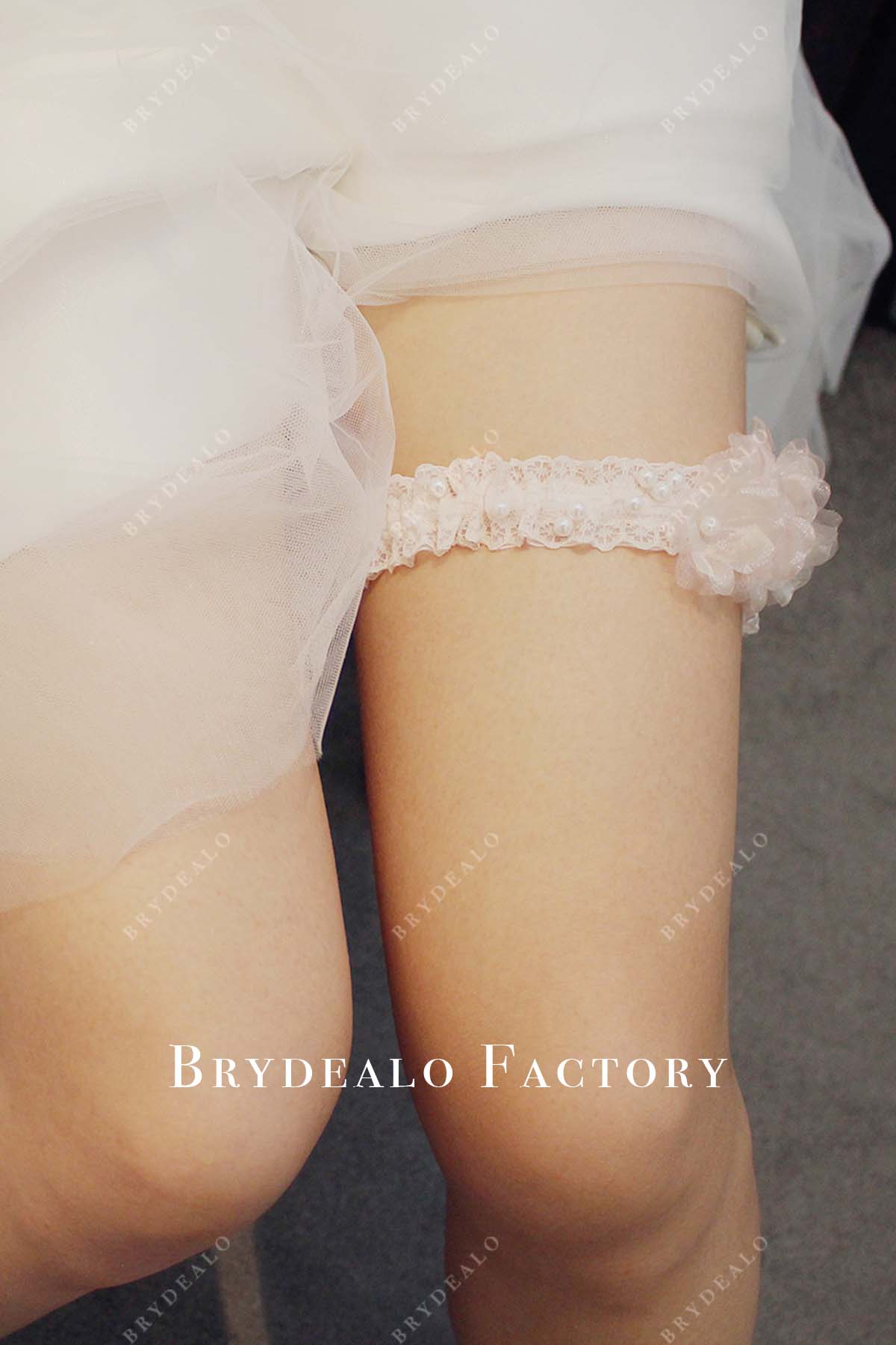 blushing pink lace wedding garter