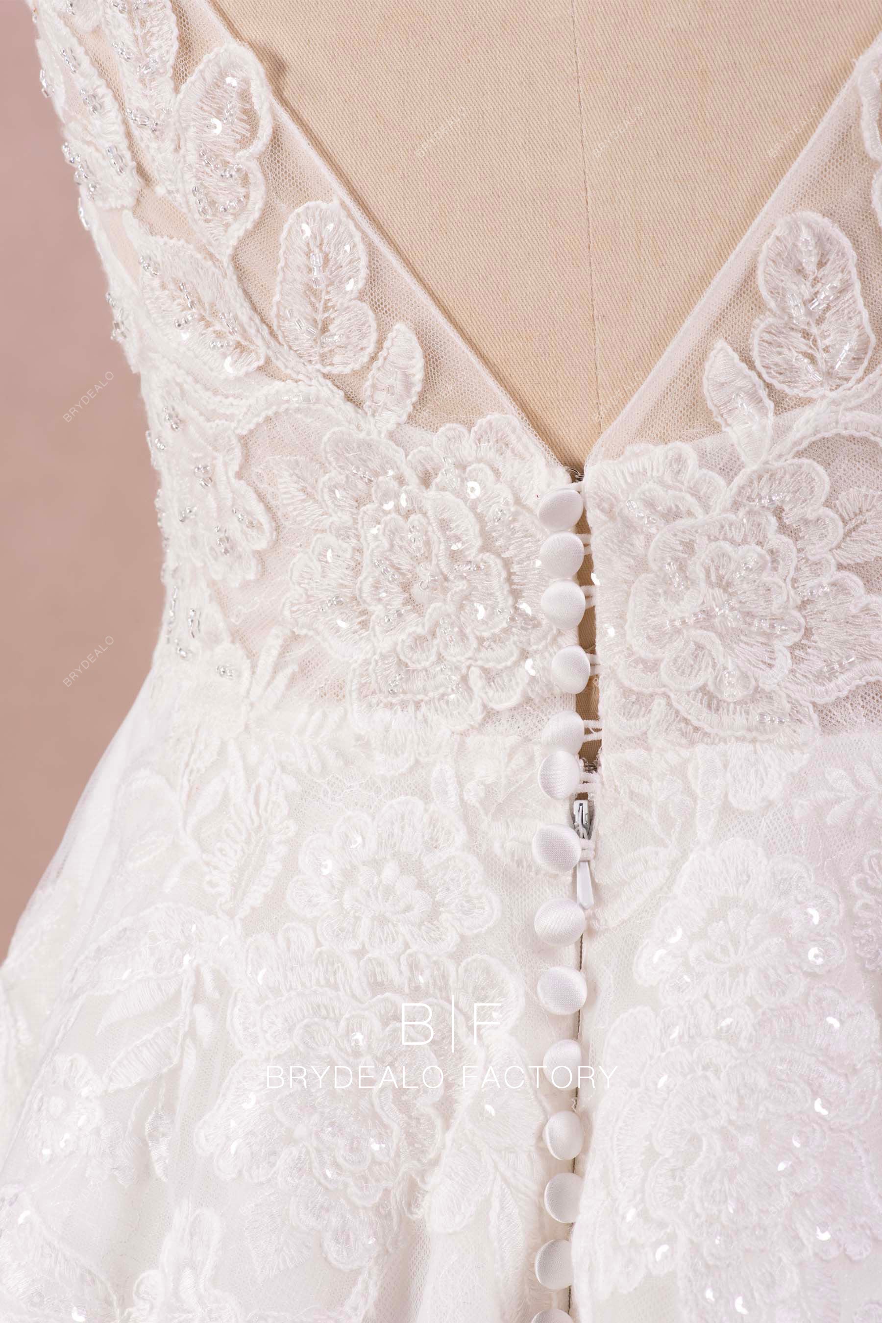 buttoned back lace wedding gown