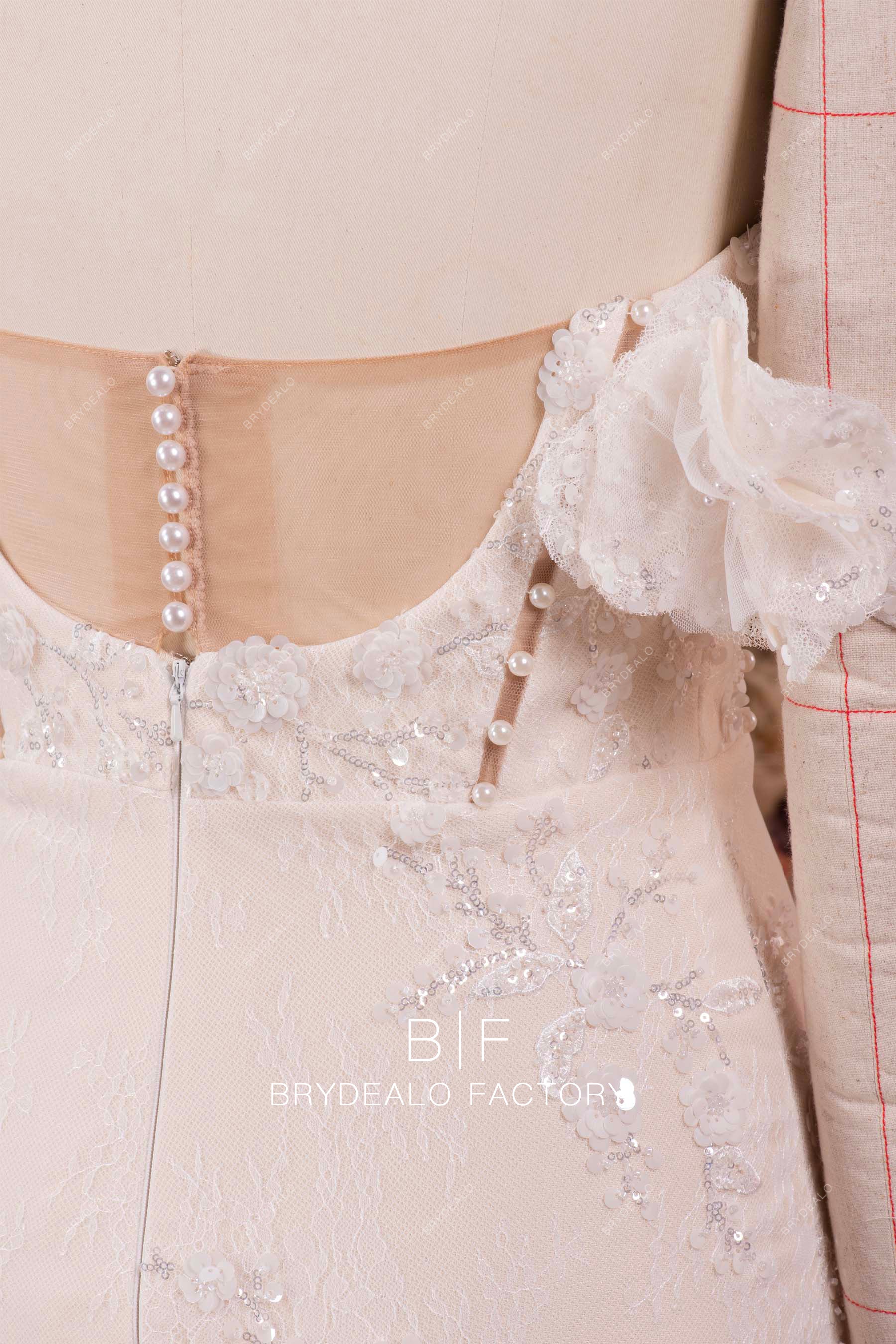 buttoned illusion back wedding dress