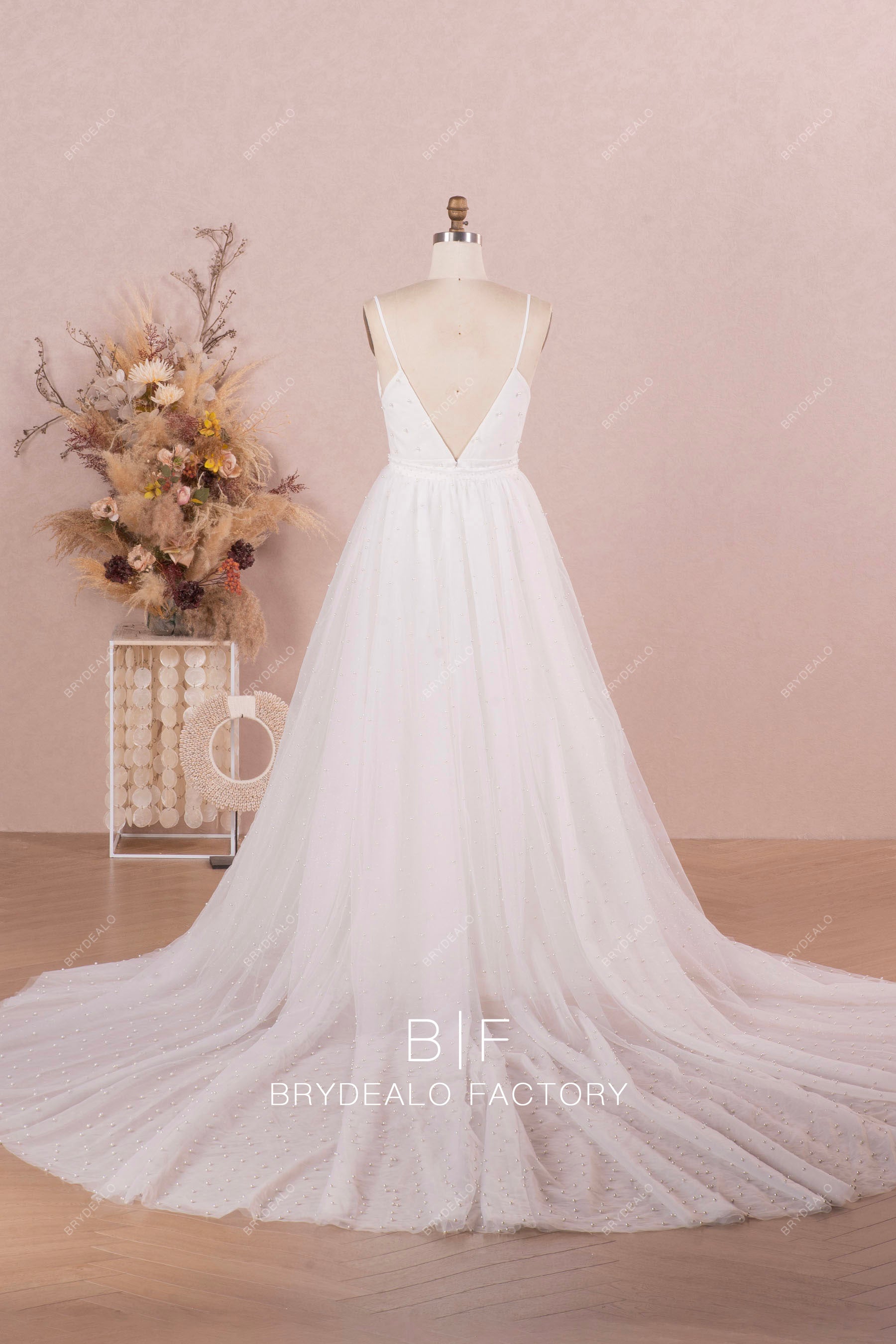 cathedral length pearl overskirt wedding dress