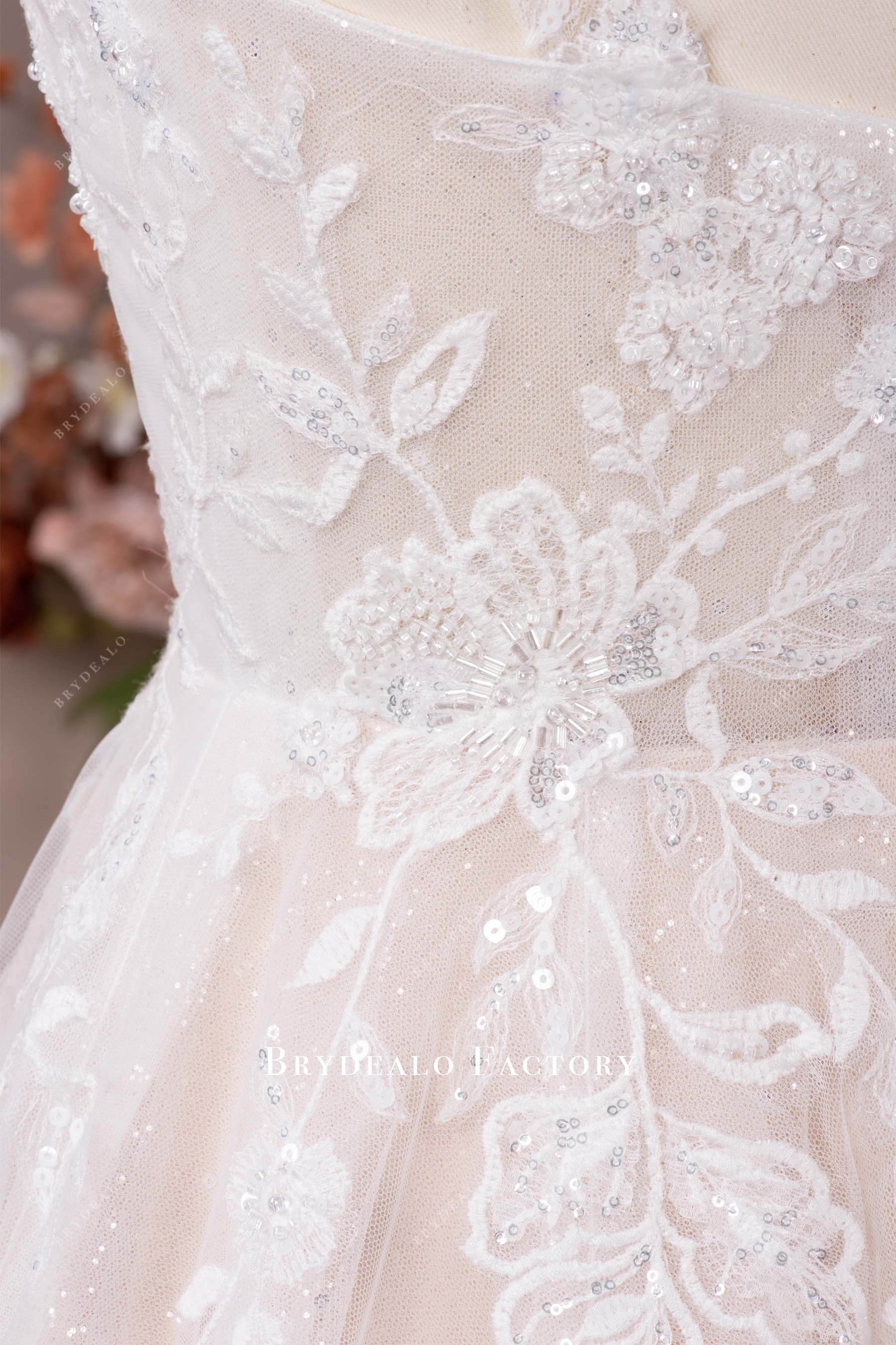 delicate beaded lace bridal gown