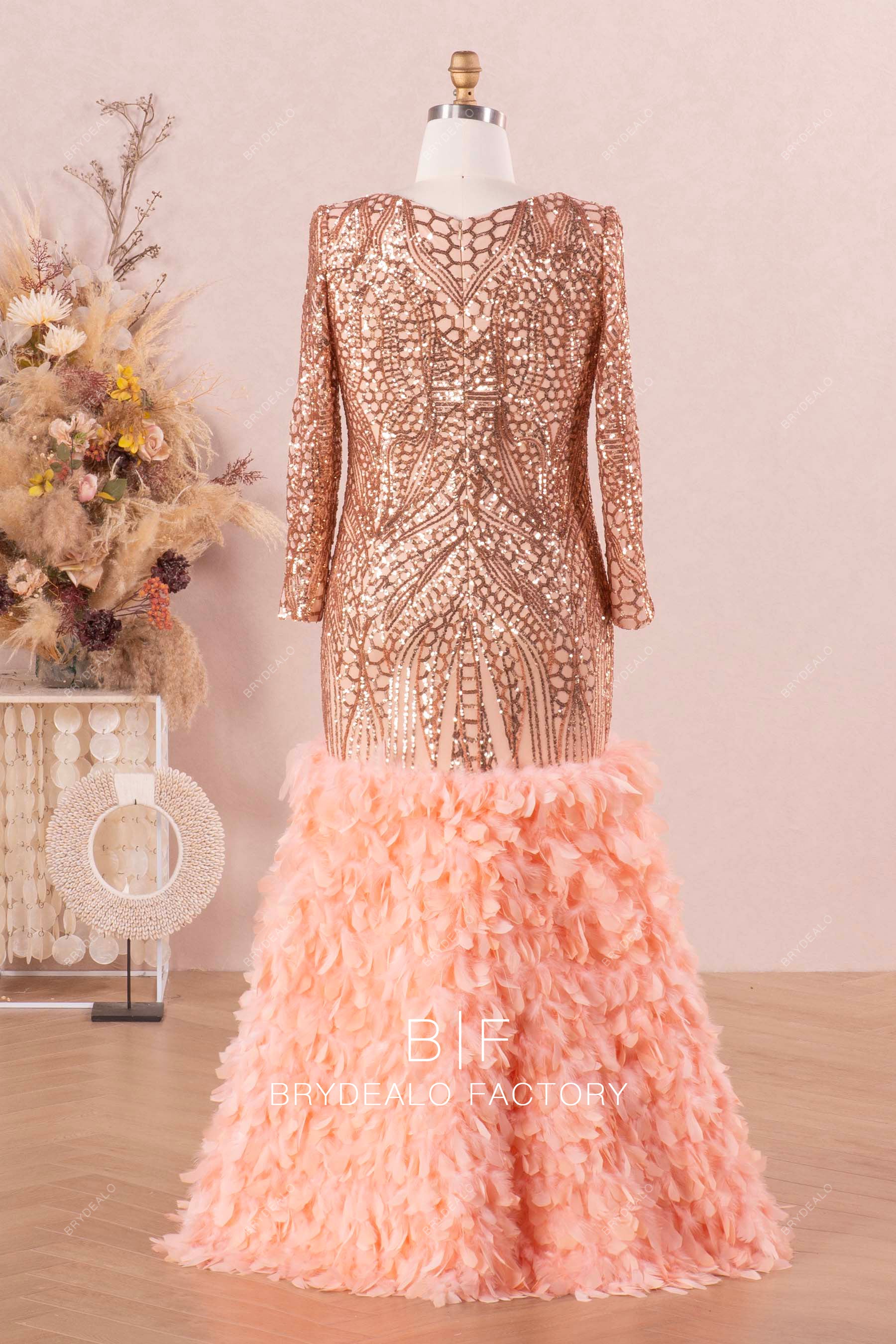 dramatic sparkly feather prom dress