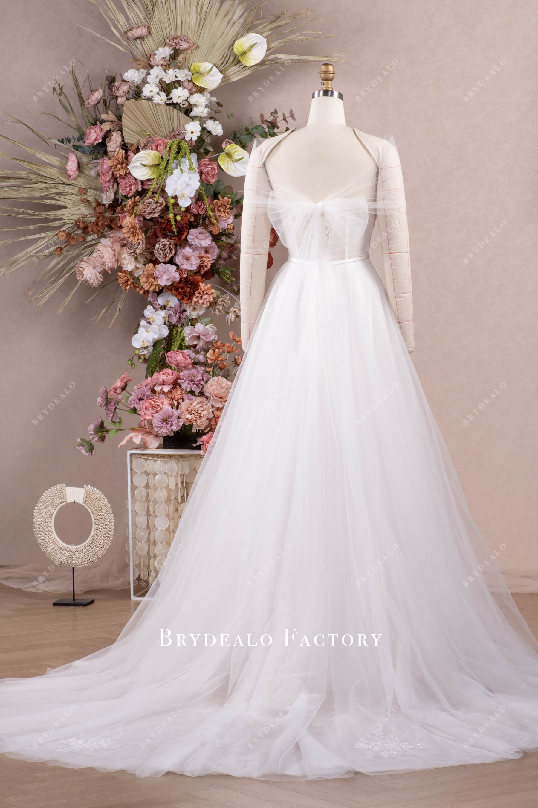 dreamy tulle long wedding dress with knot accessory