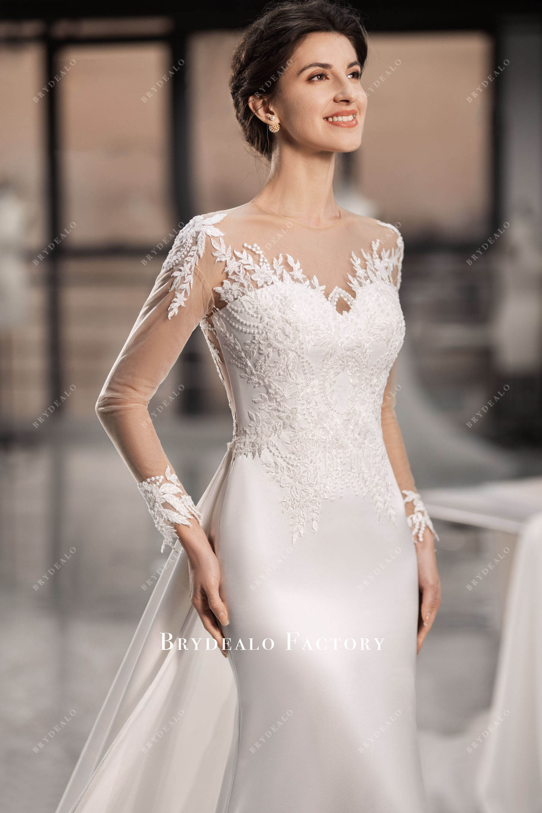 elegant beaded lace sleeved wedding dress