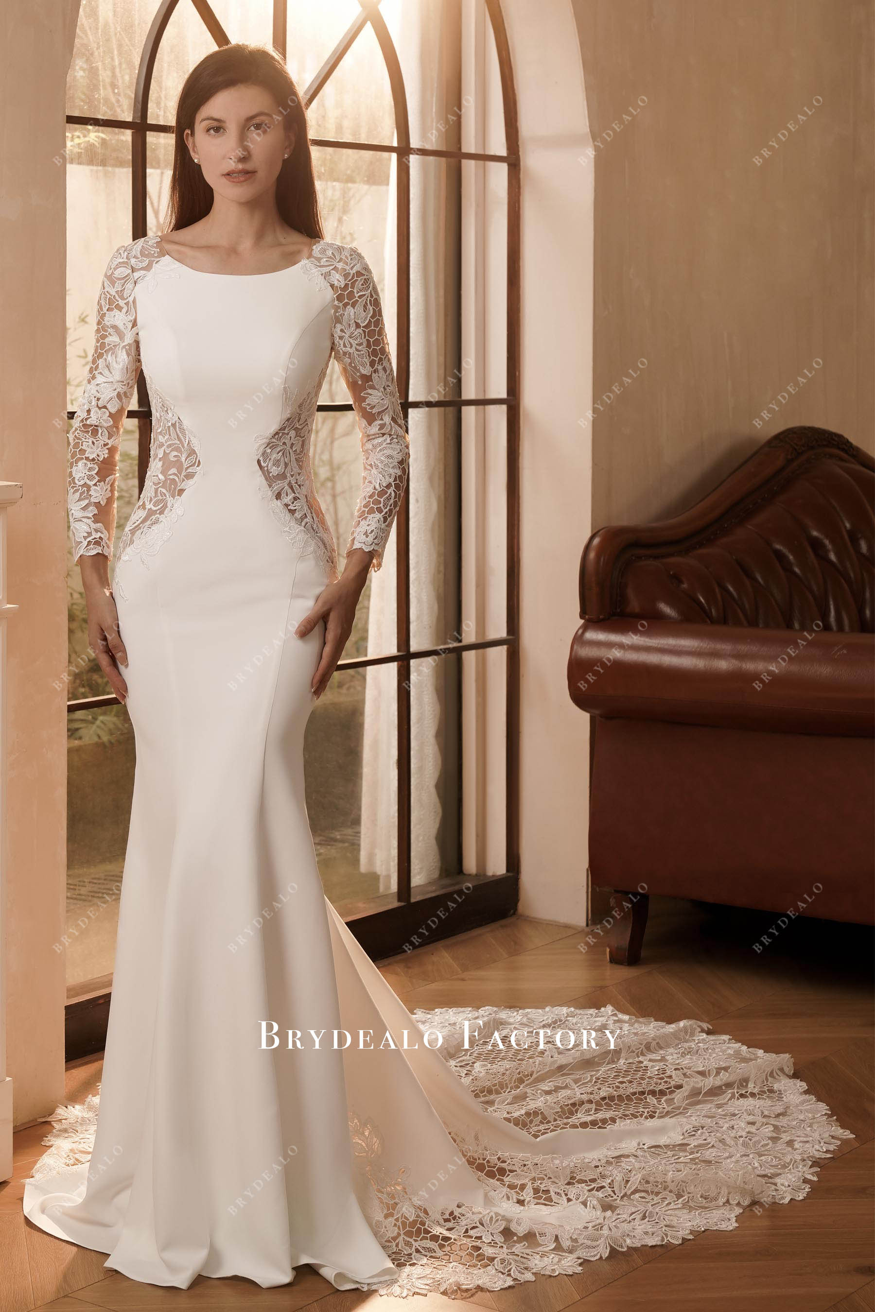 elegant lace sleeved crepe wedding dress