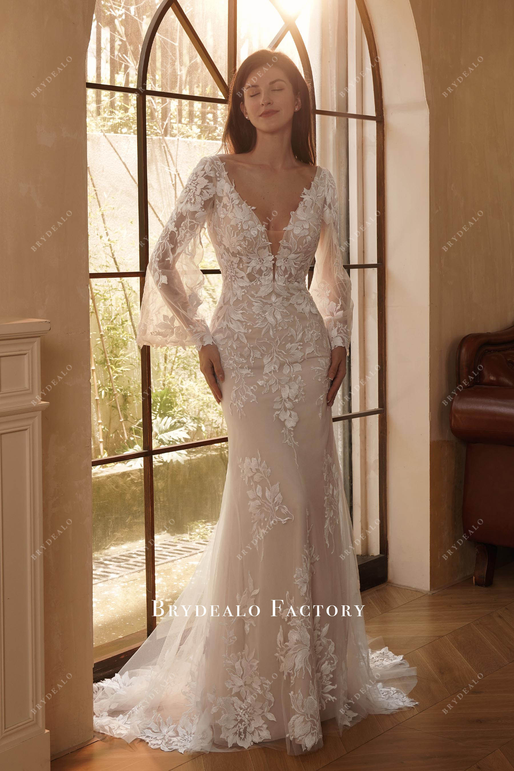 elegant plunging sleeved mermaid wedding dress