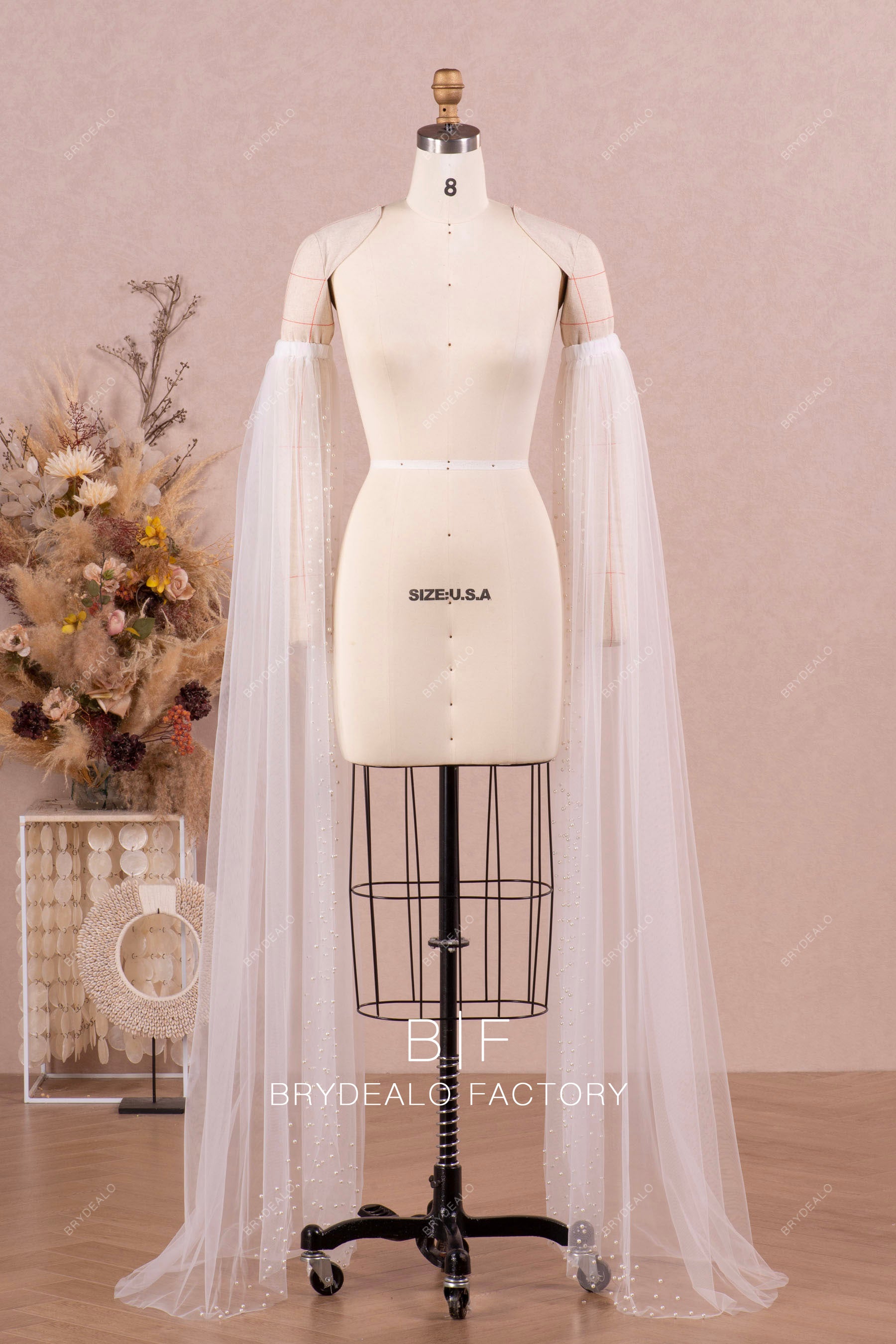 floor length pearl tulle bell sleeve