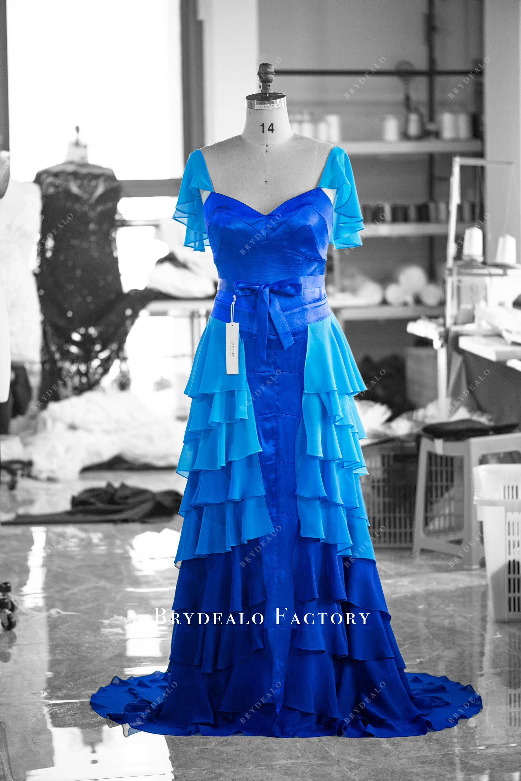 flowing royal blue tiered prom dress