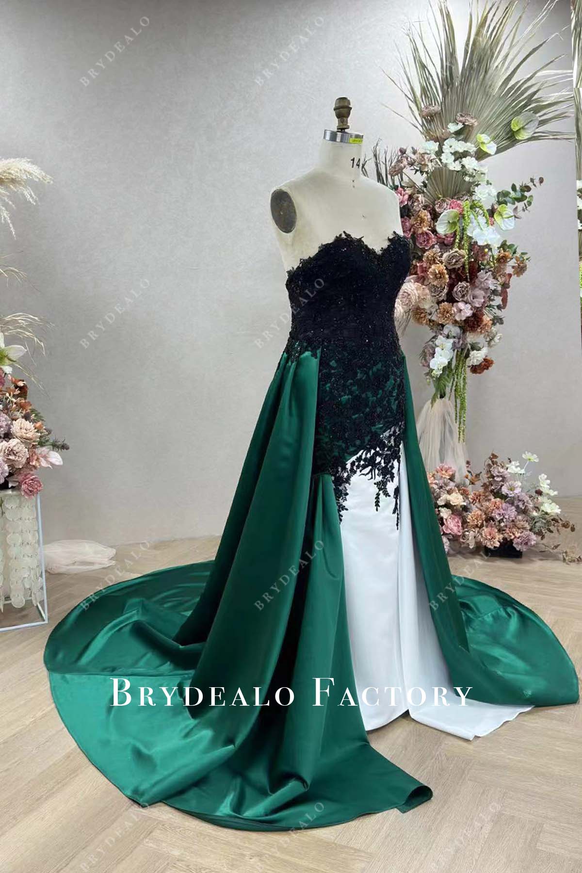 green overskirt strapless black lace white satin wedding gown