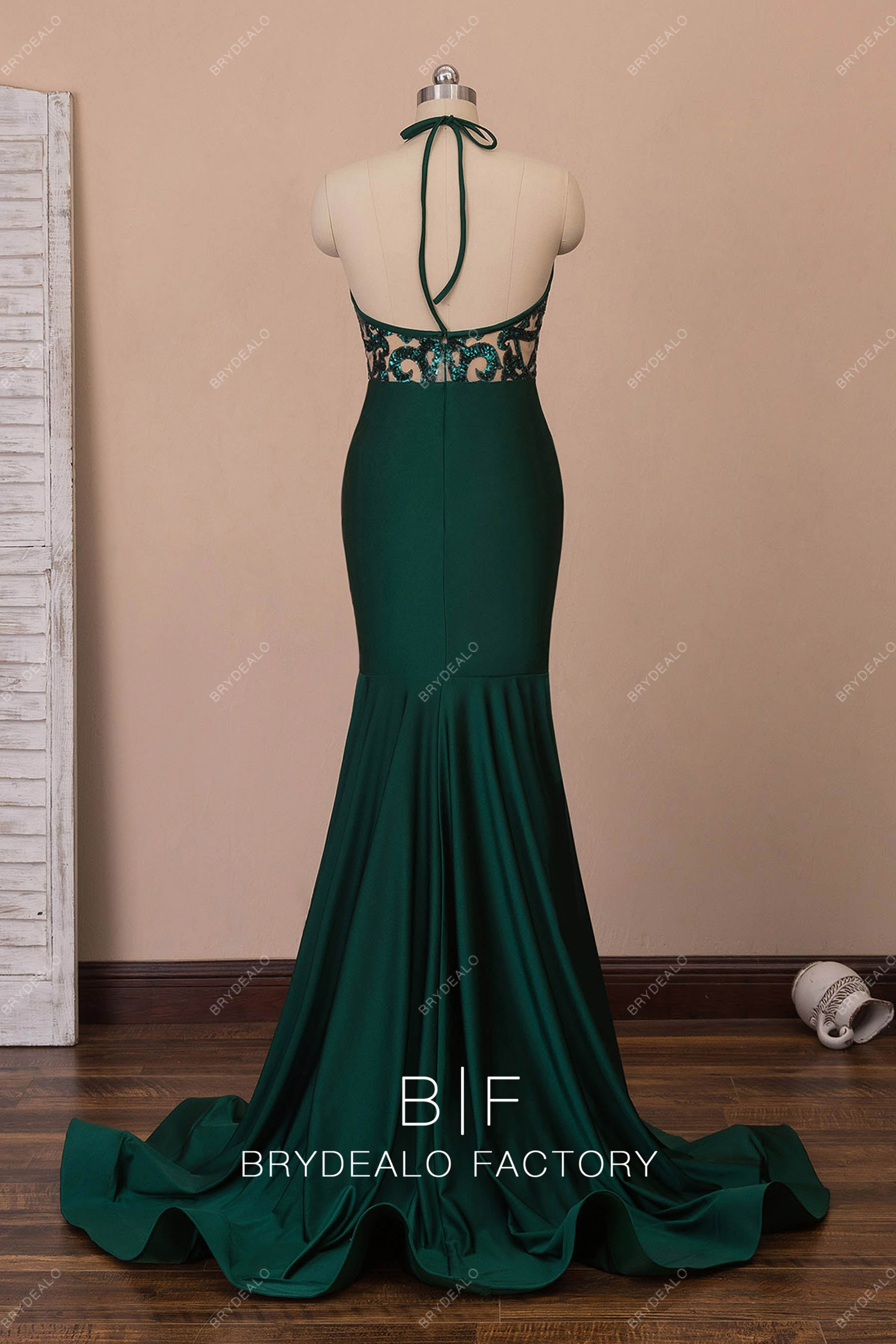 halter open back long ruffled mermaid prom gown