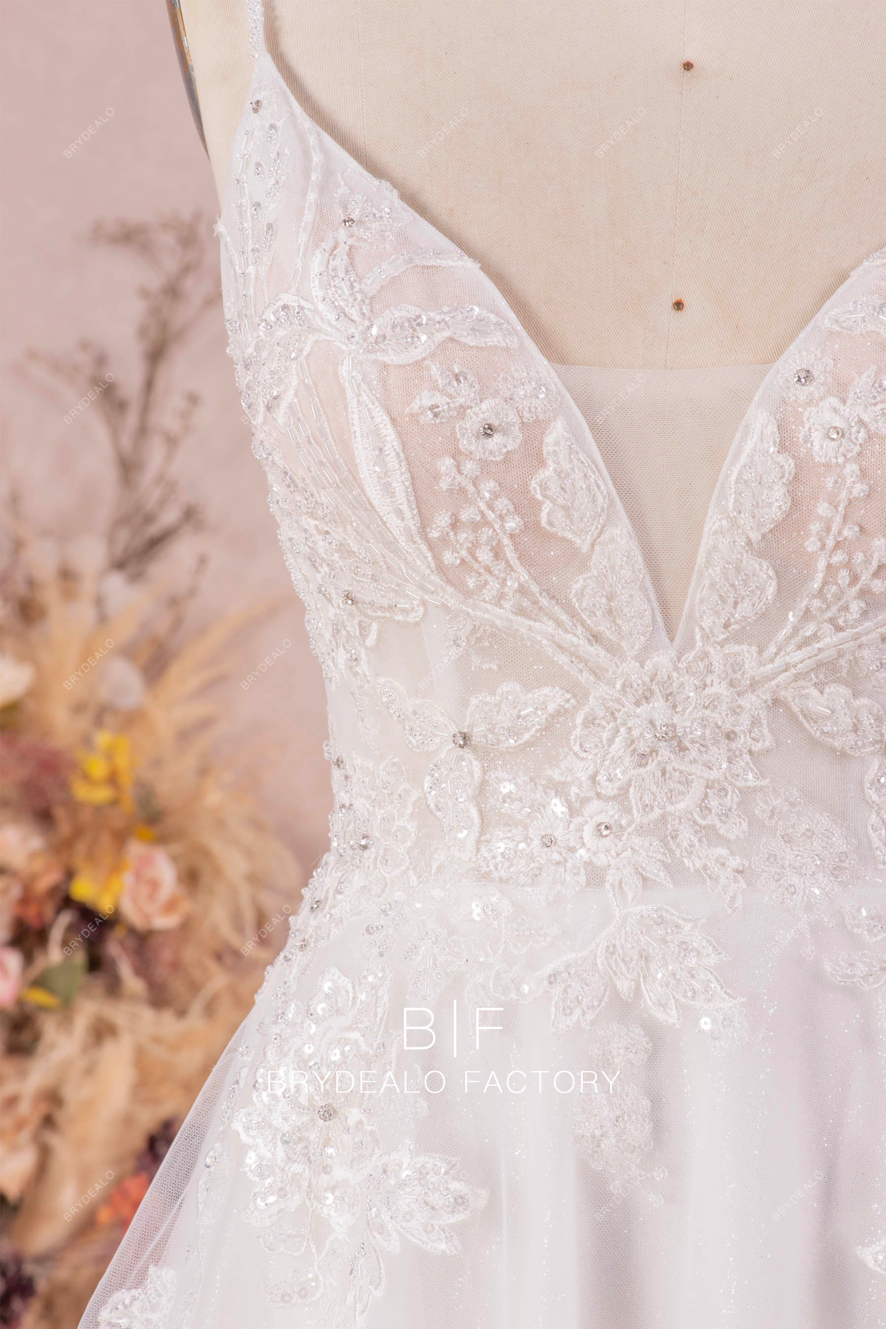 hand-sewn beaded lace wedding dress