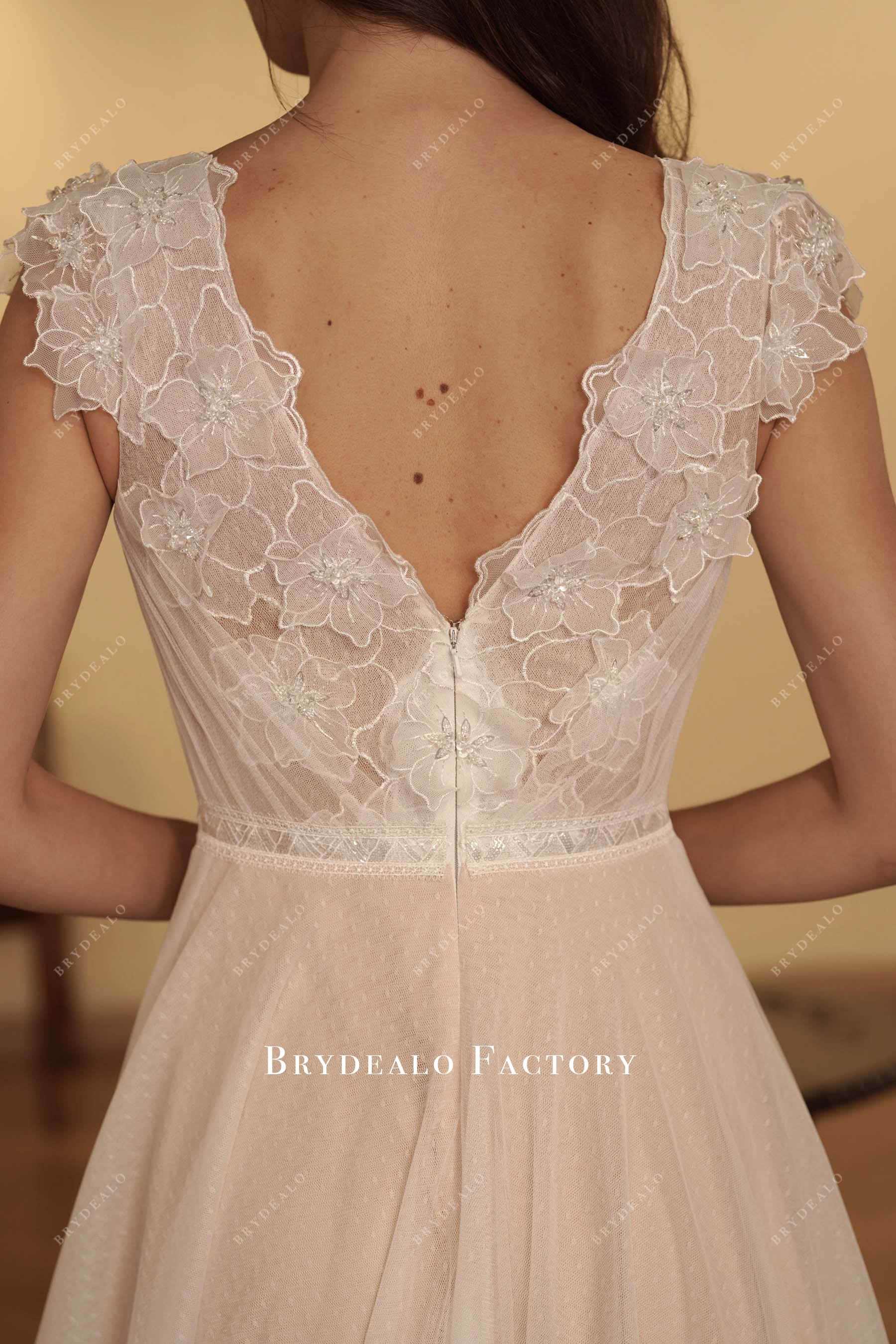 hand-sewn beaded flower lace wedding dress