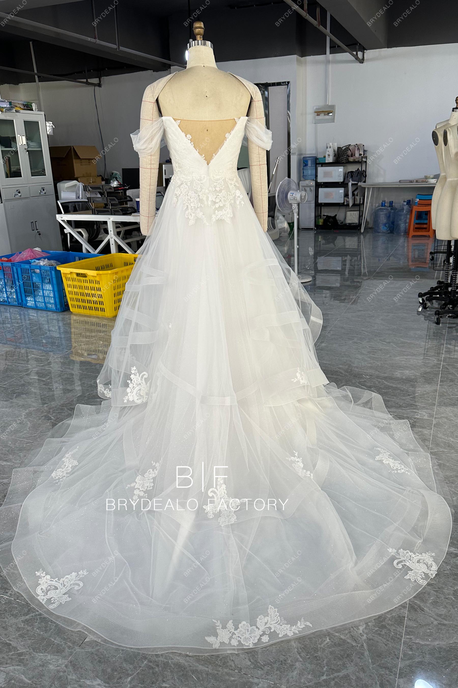 illusion back long train designer wedding gown
