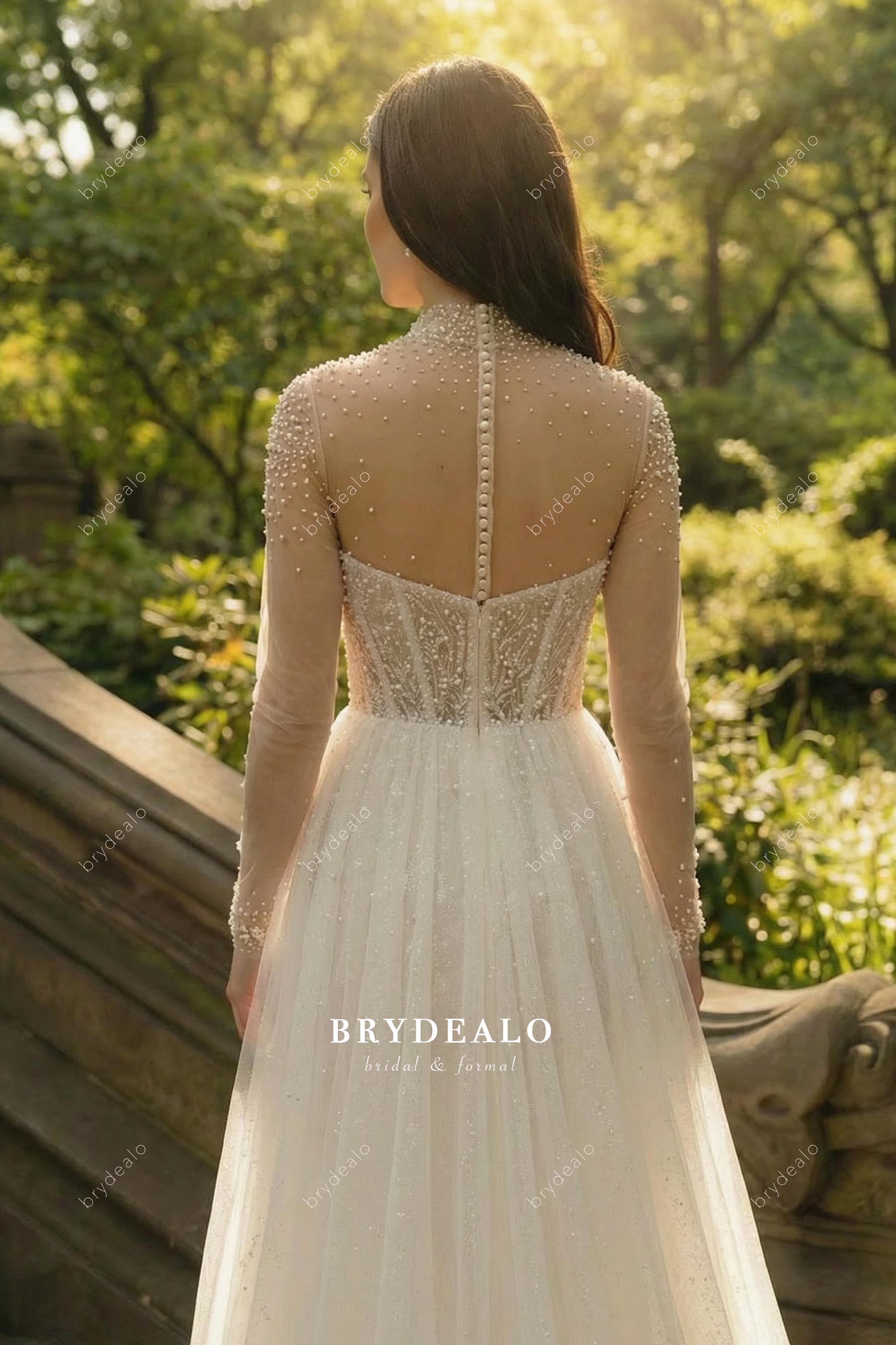 illusion buttoned back bridal dress