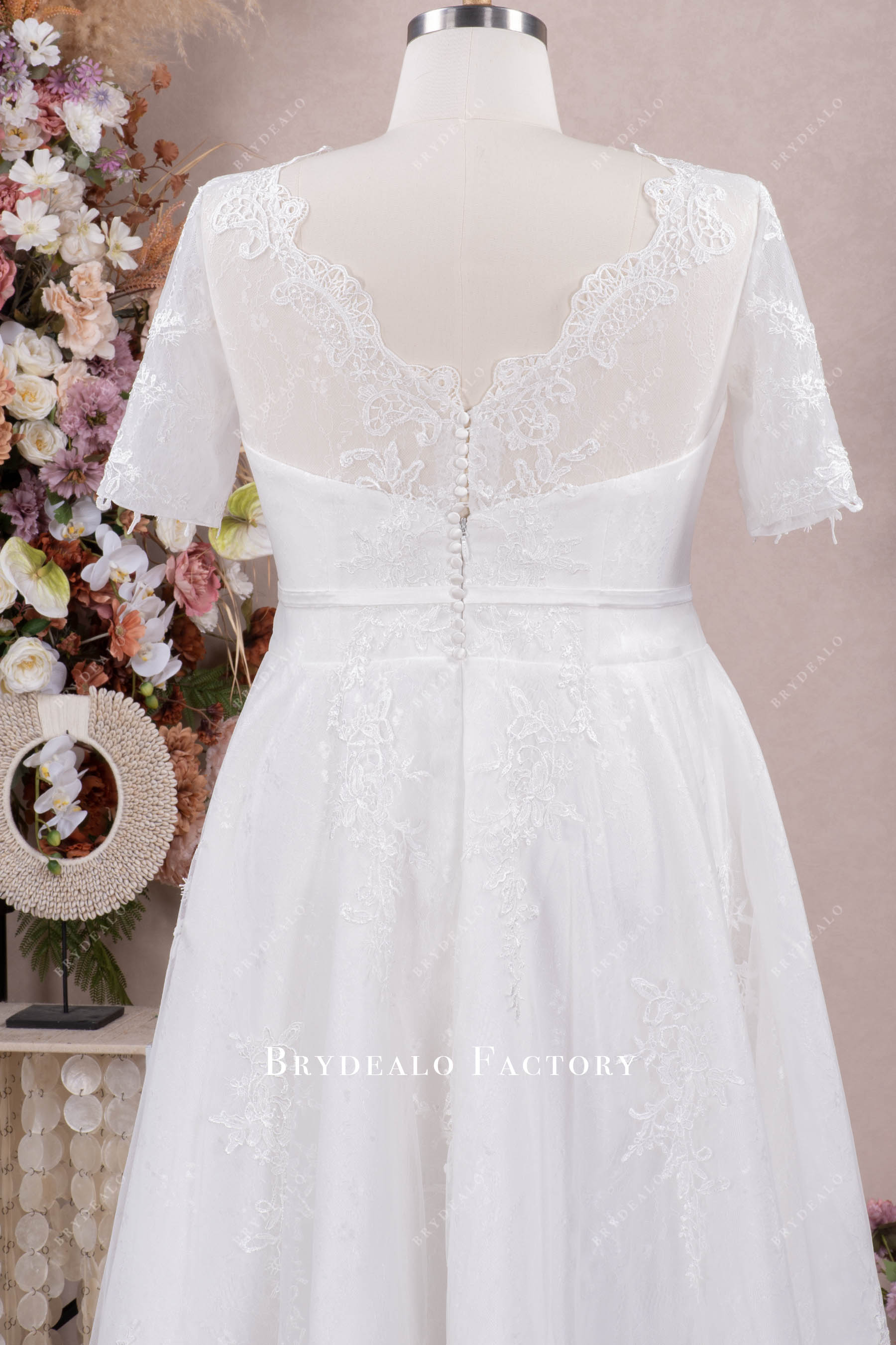 illusion buttoned back lace wedding gown