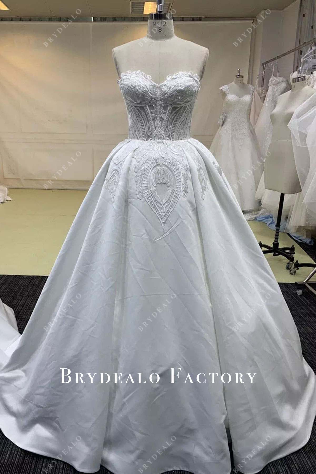 light ivory lace strapless wedding ballgown