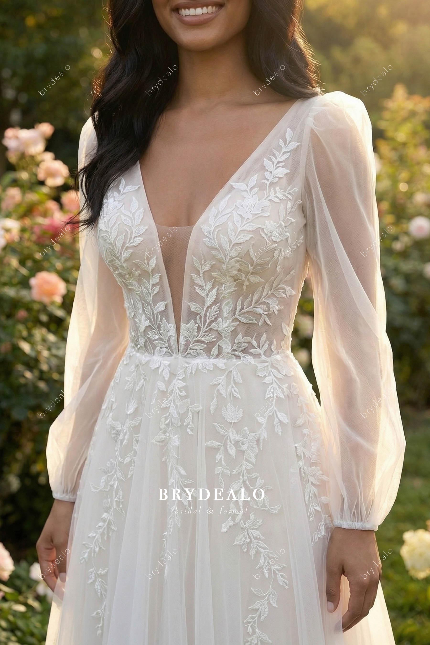 light ivory plunging neck wedding dress