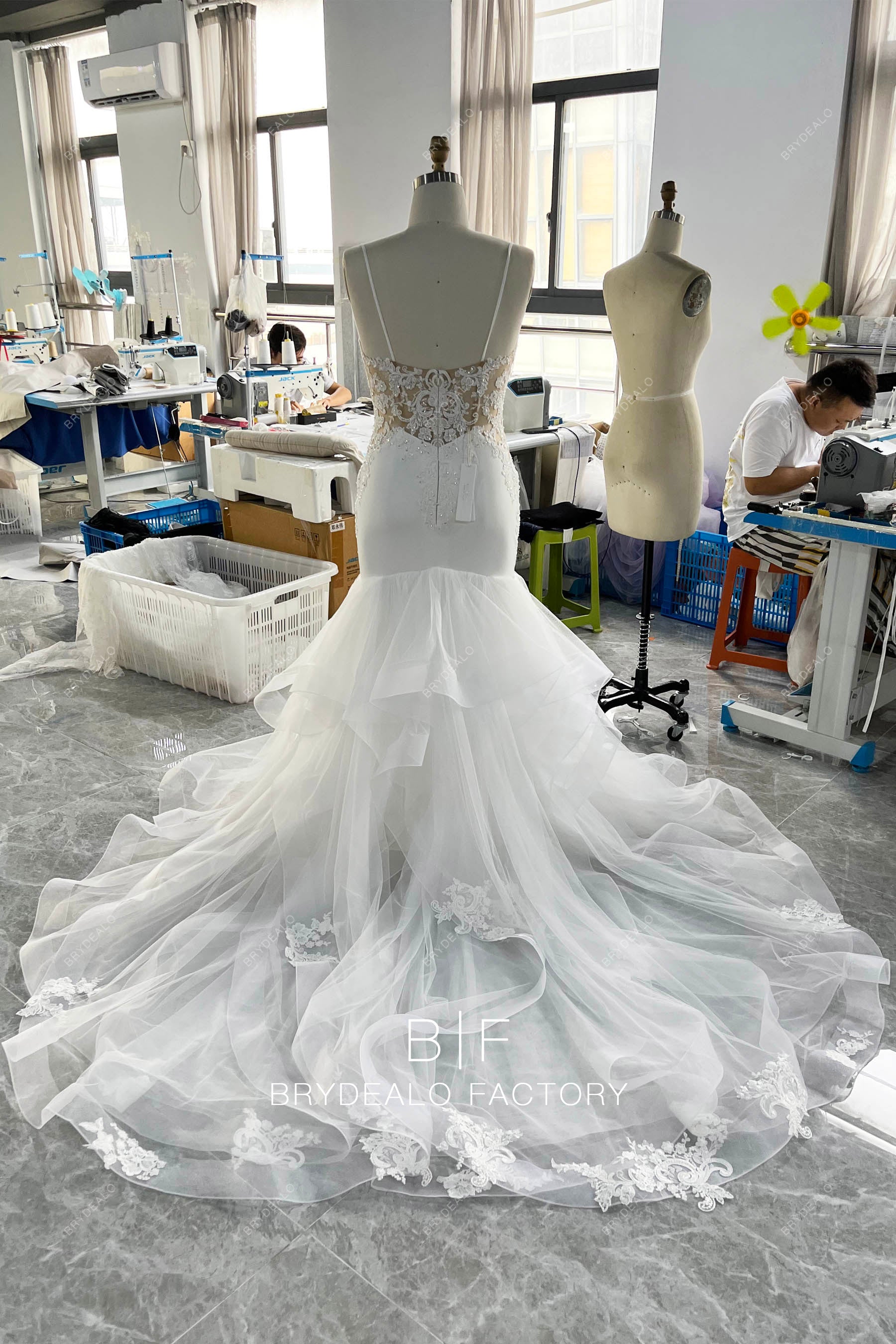 long ruffled train mermaid wedding dress