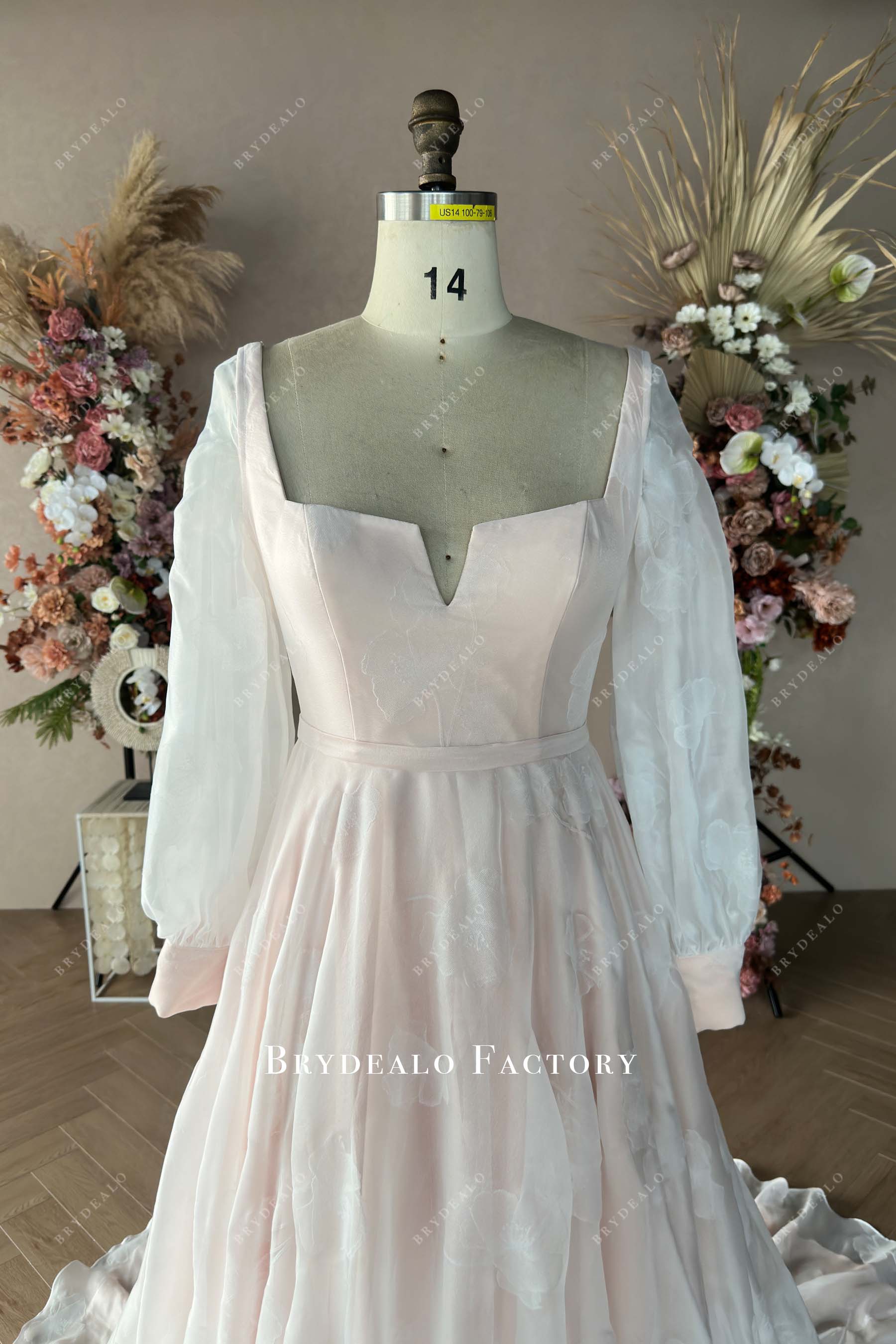 nude pink V-cut wedding dress