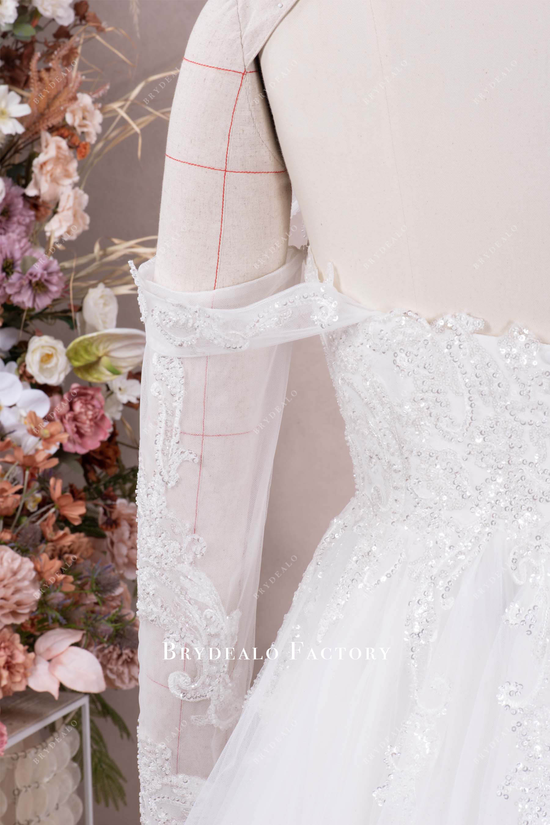 off-shoulder beaded lace bridal gown