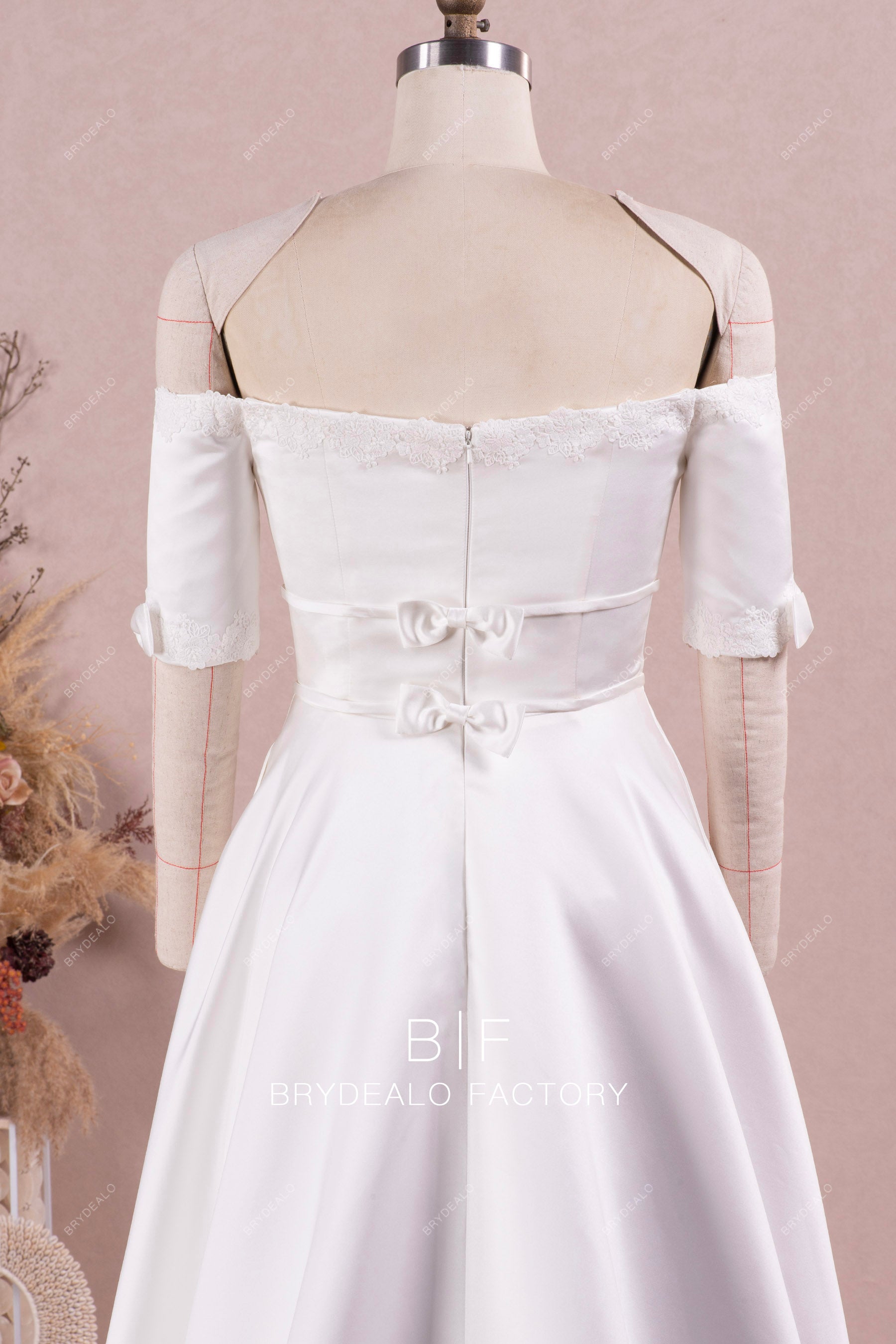off shoulder wedding dress with bowknot belts