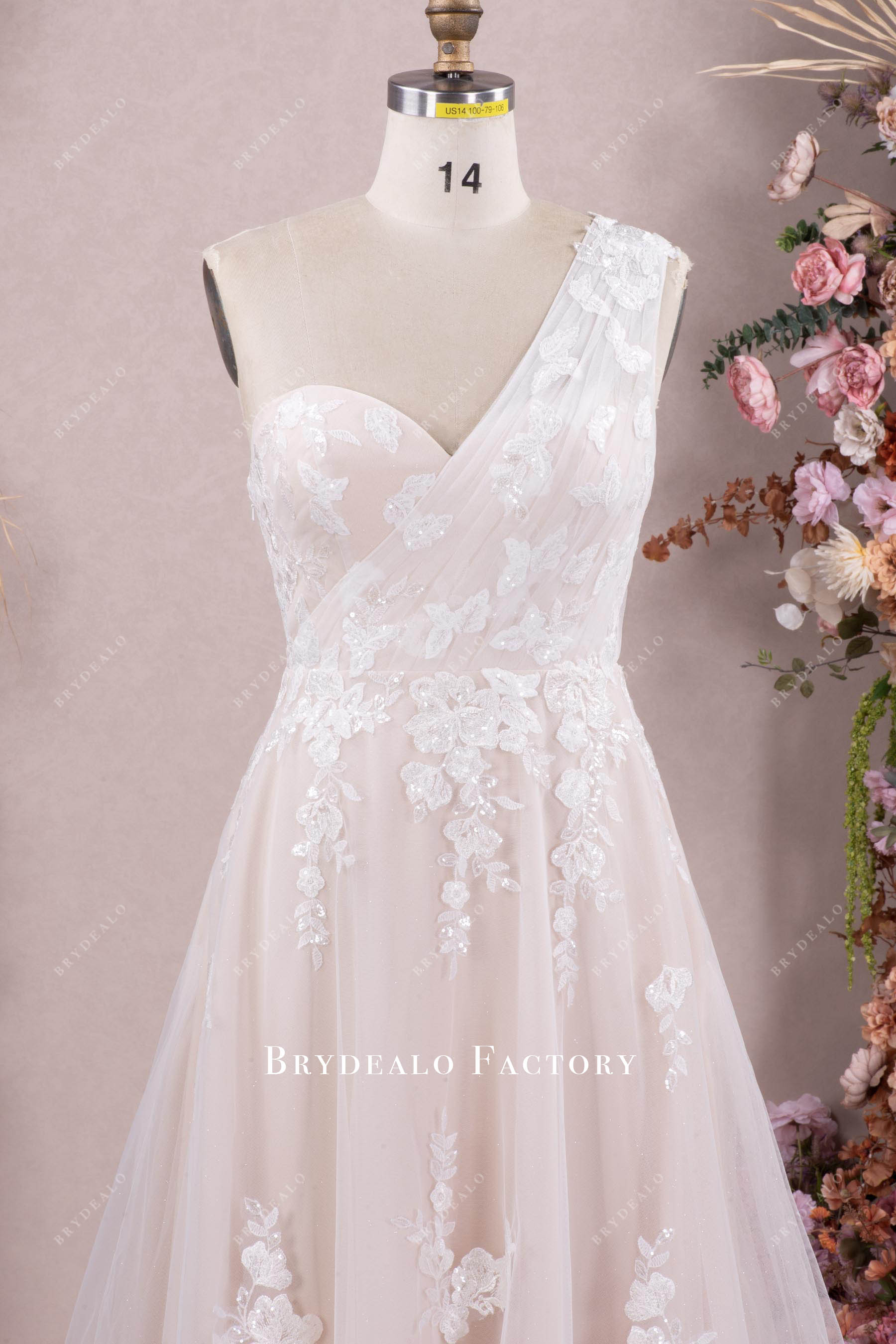 one-shoulder lace wedding dress