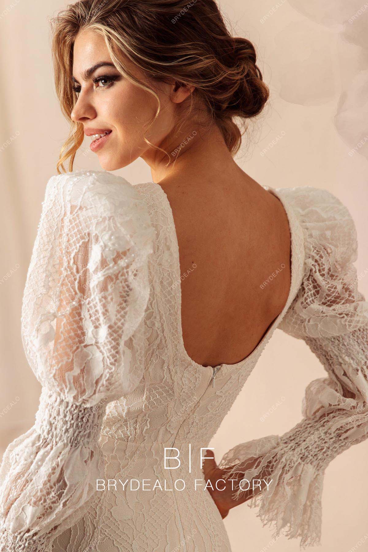 open back sheer long puffy sleeves wedding dress