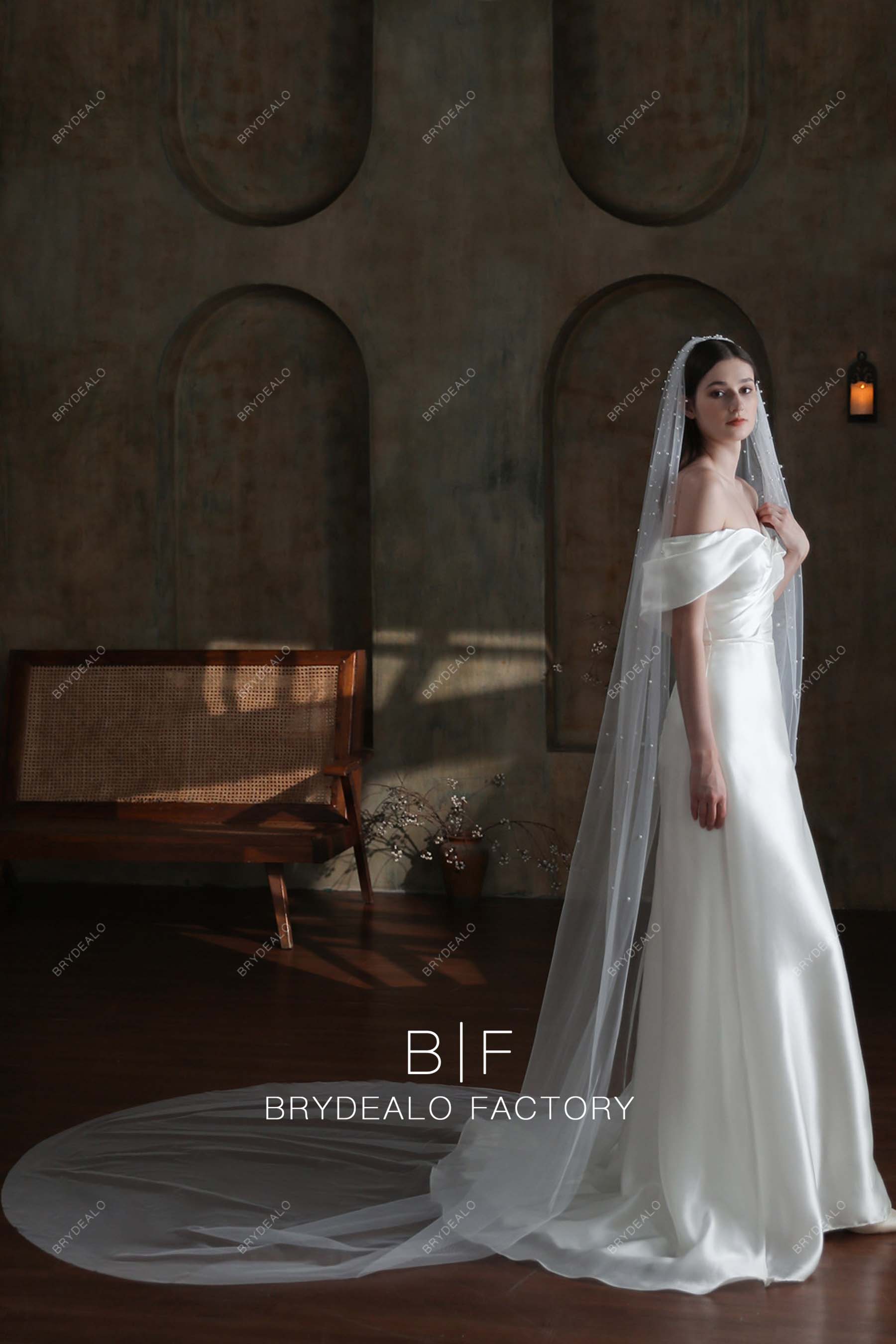 https://brydealofactory.com/cdn/shop/files/pearls-scattered-Cathedral-Length-wedding-veil-08178.jpg?v=1697013646&width=1800