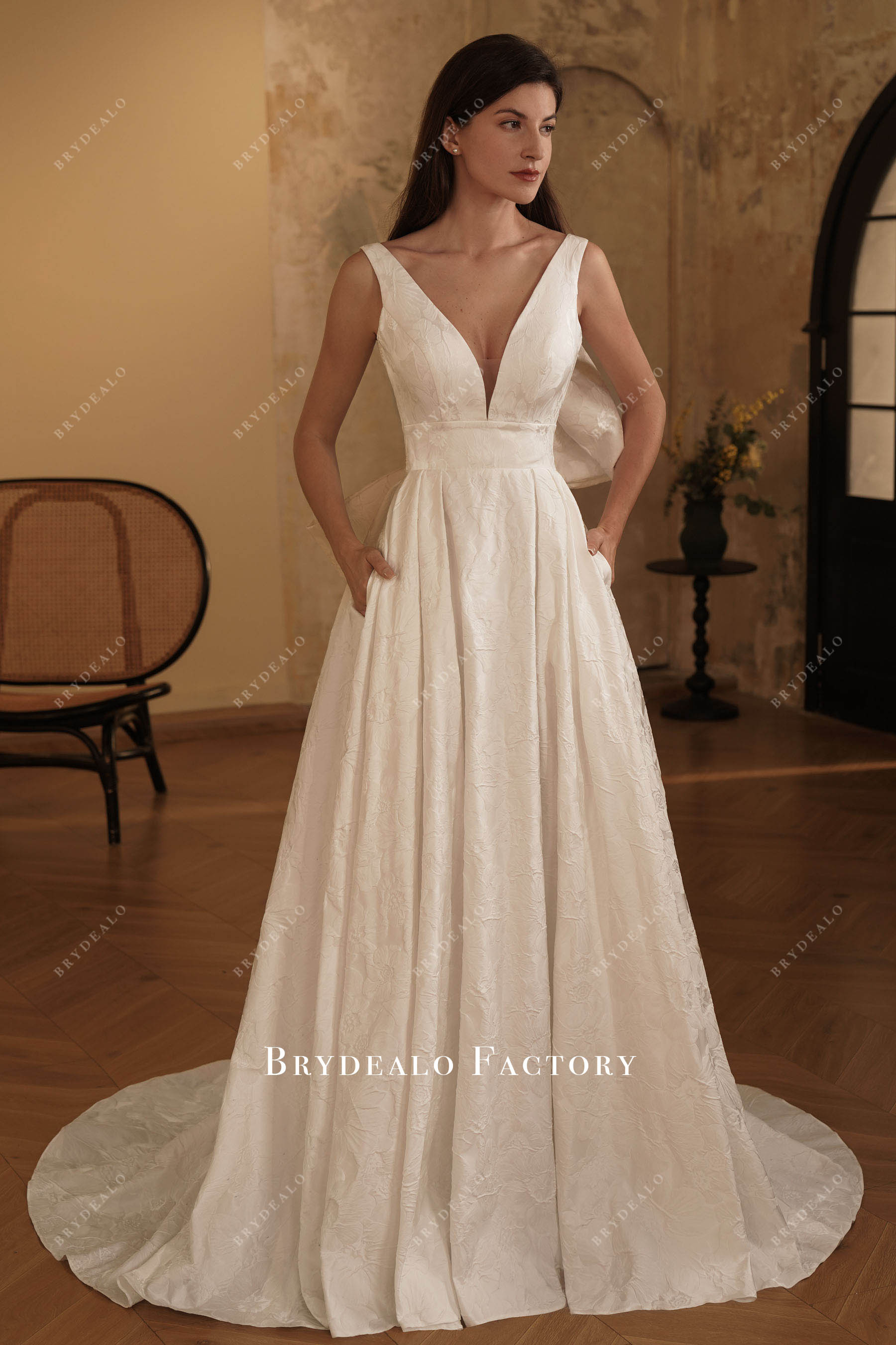 plunging A-line pockets wedding dress