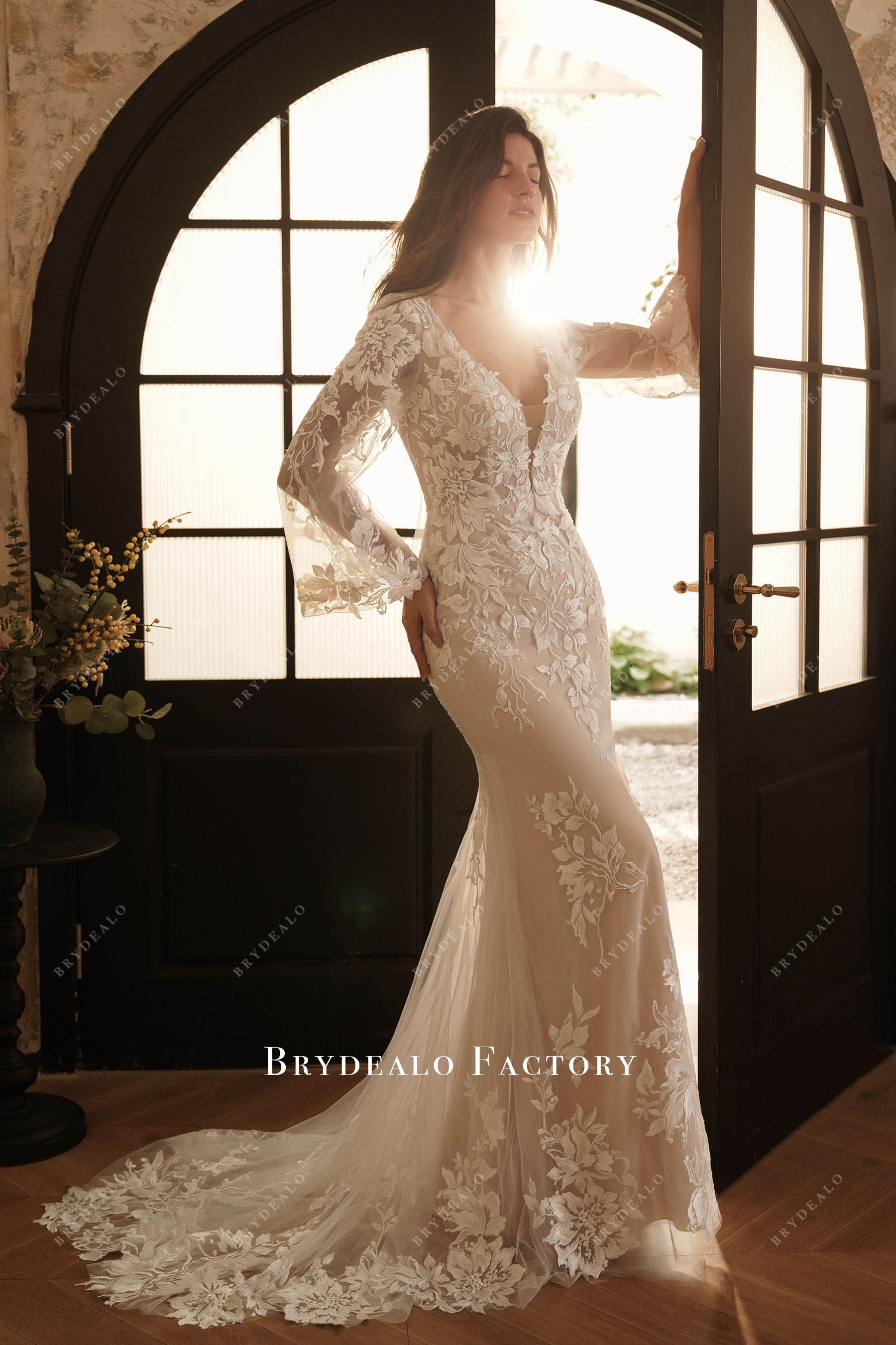 plunging mermaid lace wedding dress