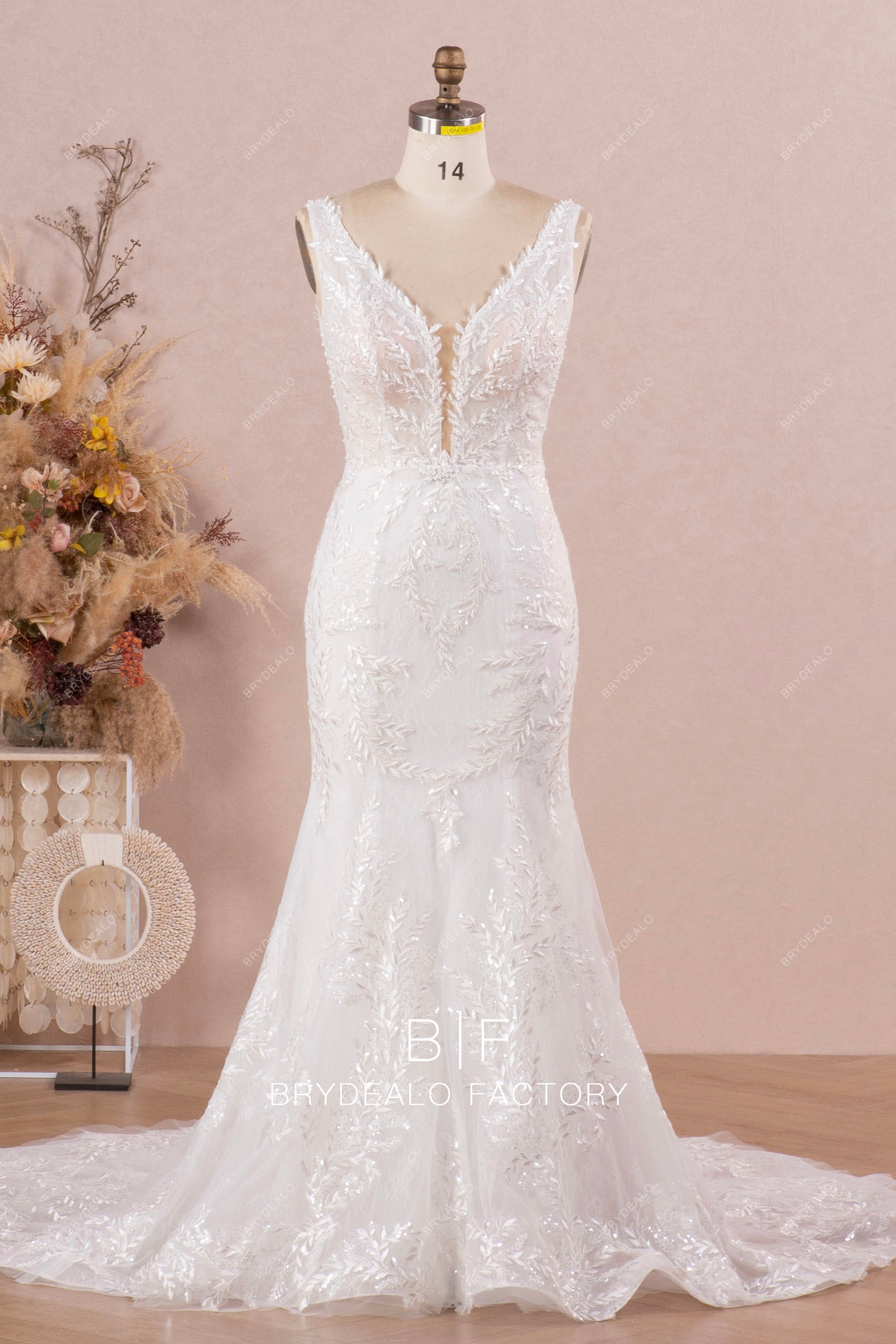 plunging mermaid shimmery lace wedding dress