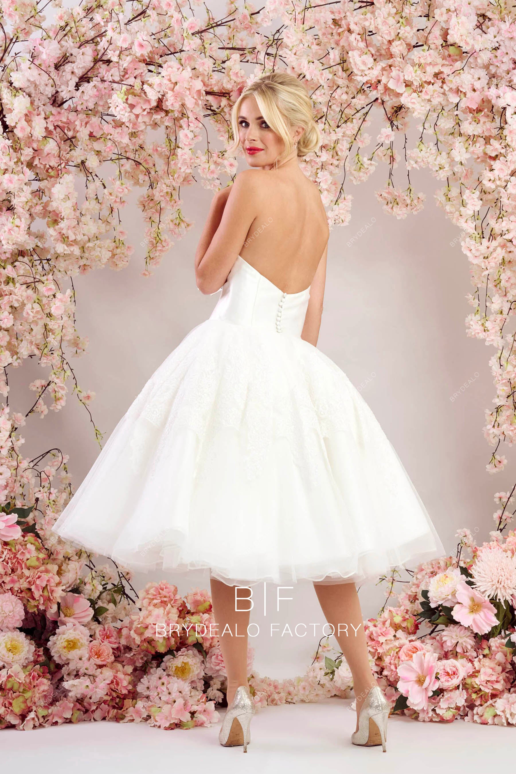 puffy A-line open back wedding dress