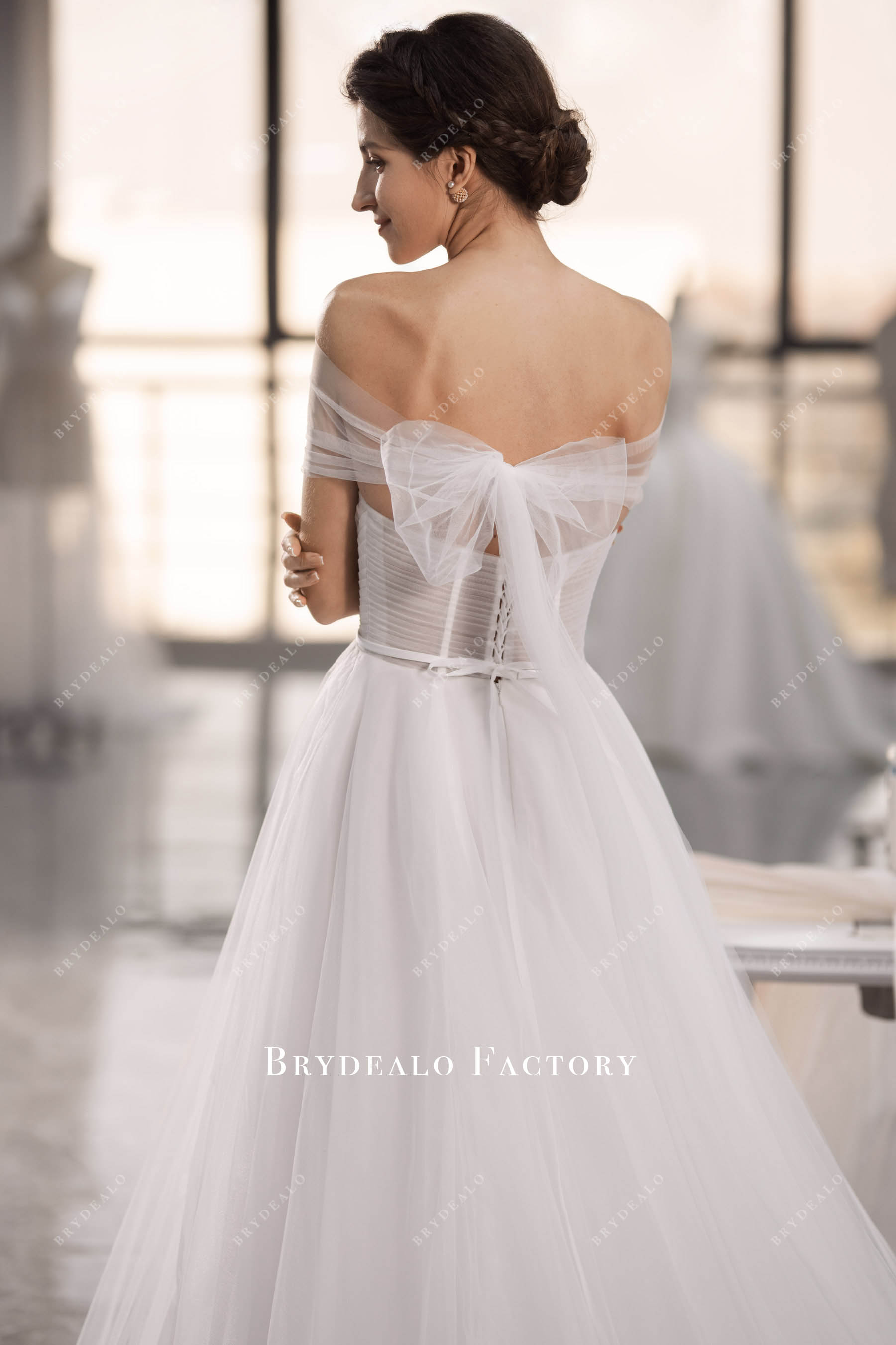 removable tulle wrap wedding gown
