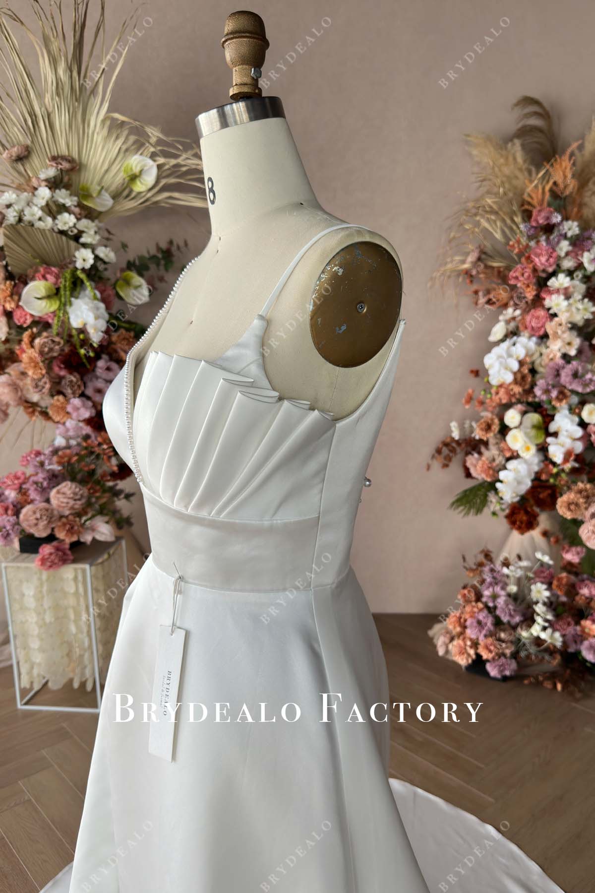 ruffled sleeveless bridal satin dress