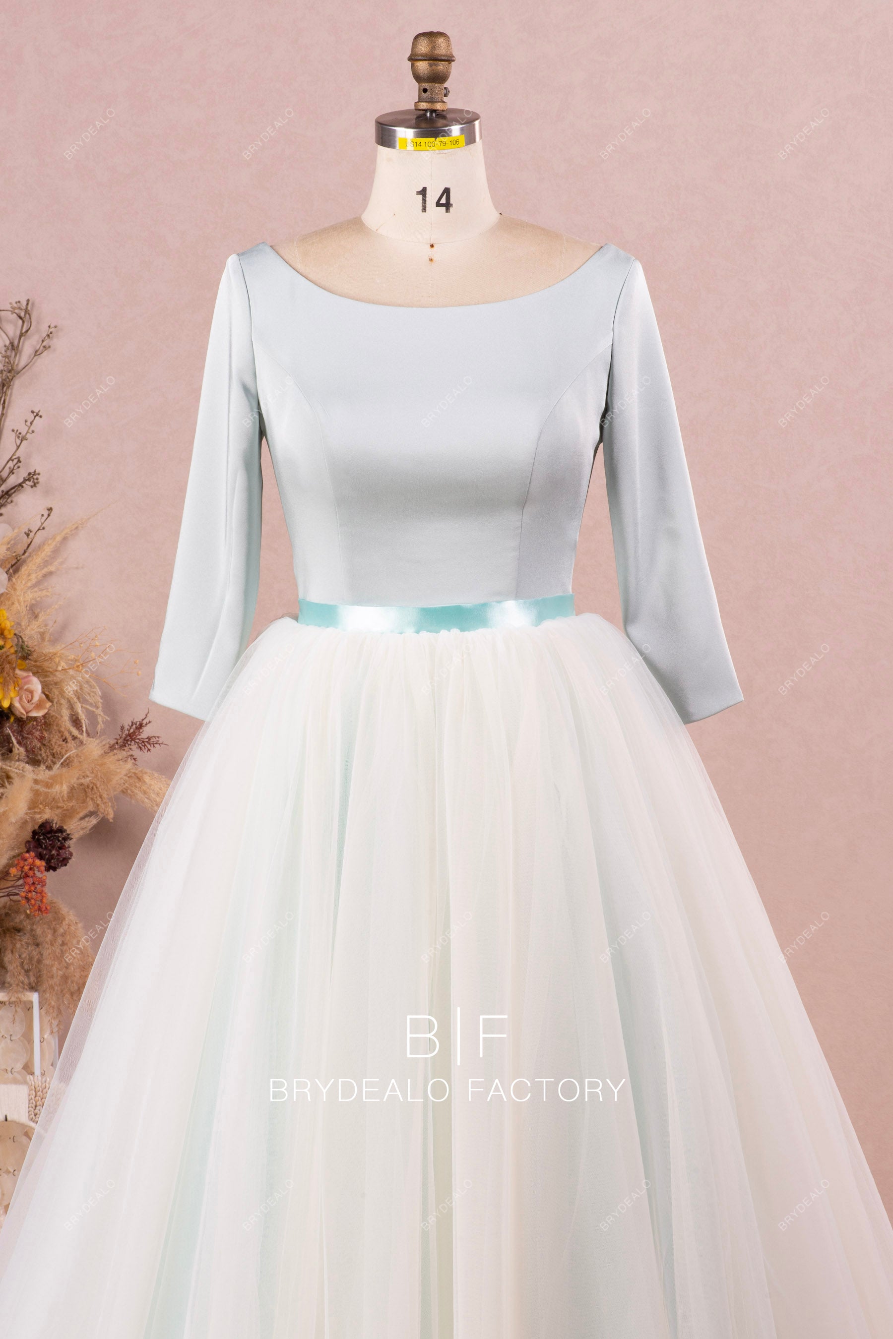 sleeved satin boat neck wedding gown