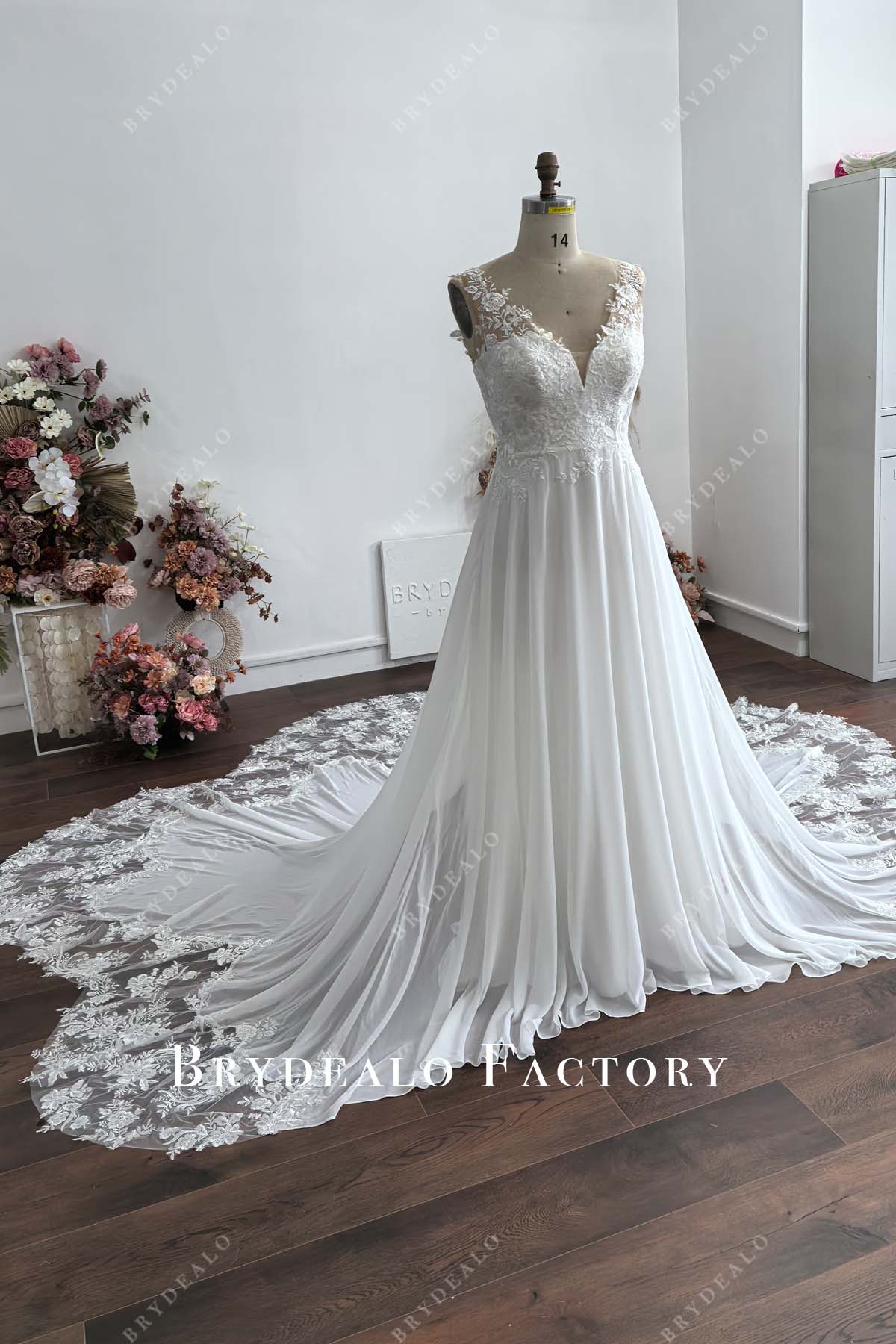 sleeveless designer lcae wedding dress