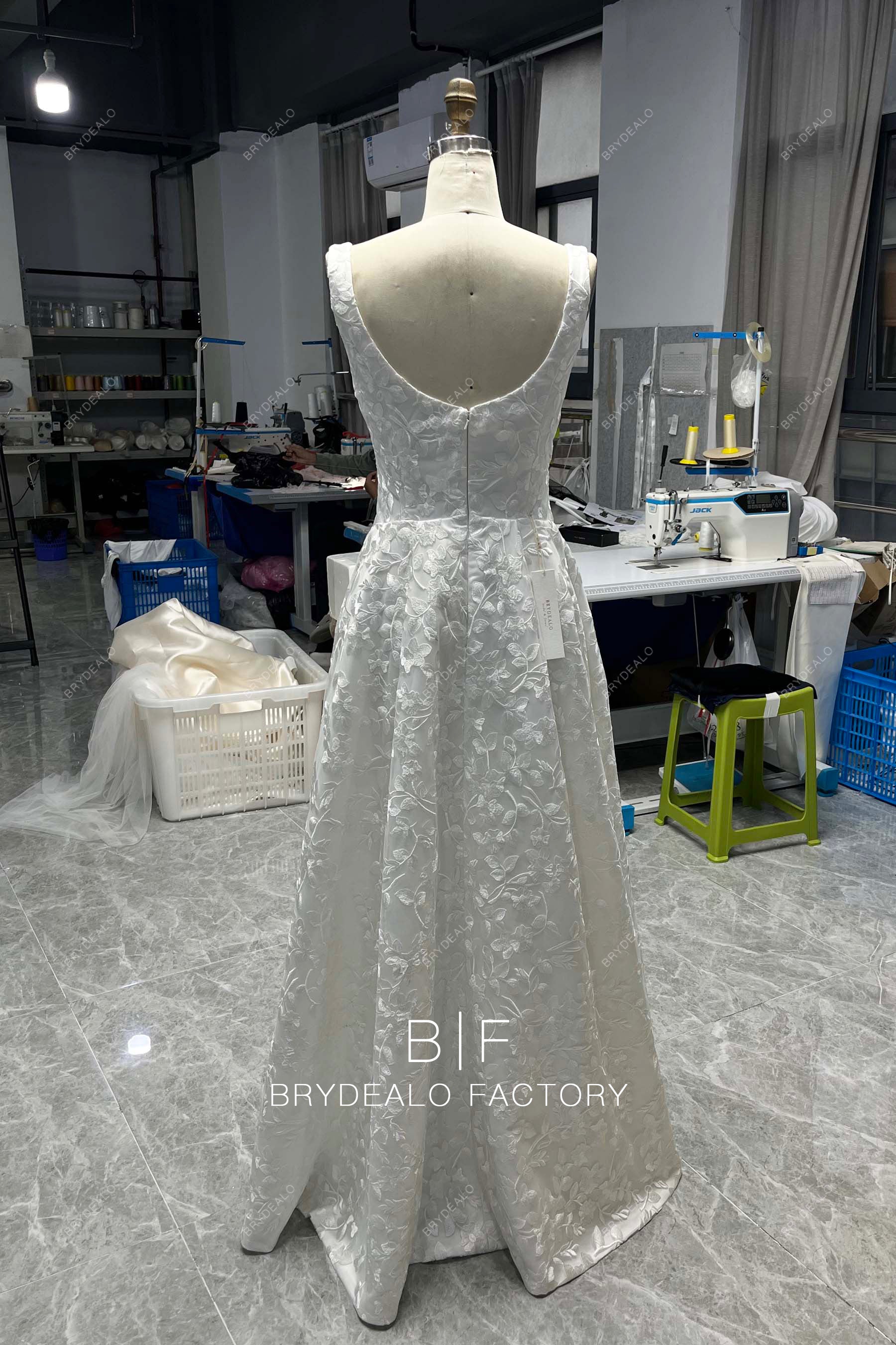 sleeveless floor length lace wedding dress