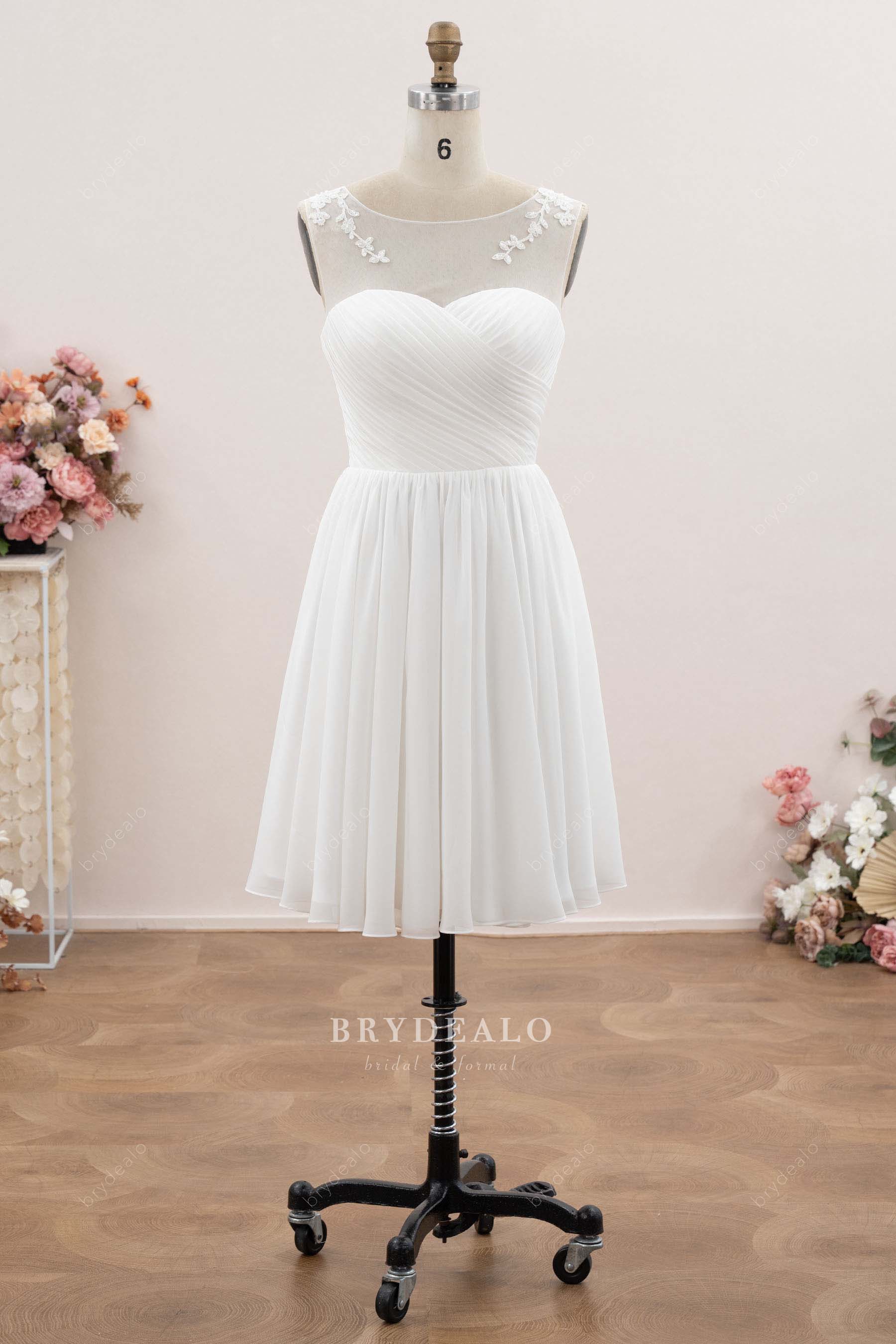 sleeveless illusion neck wedding dress