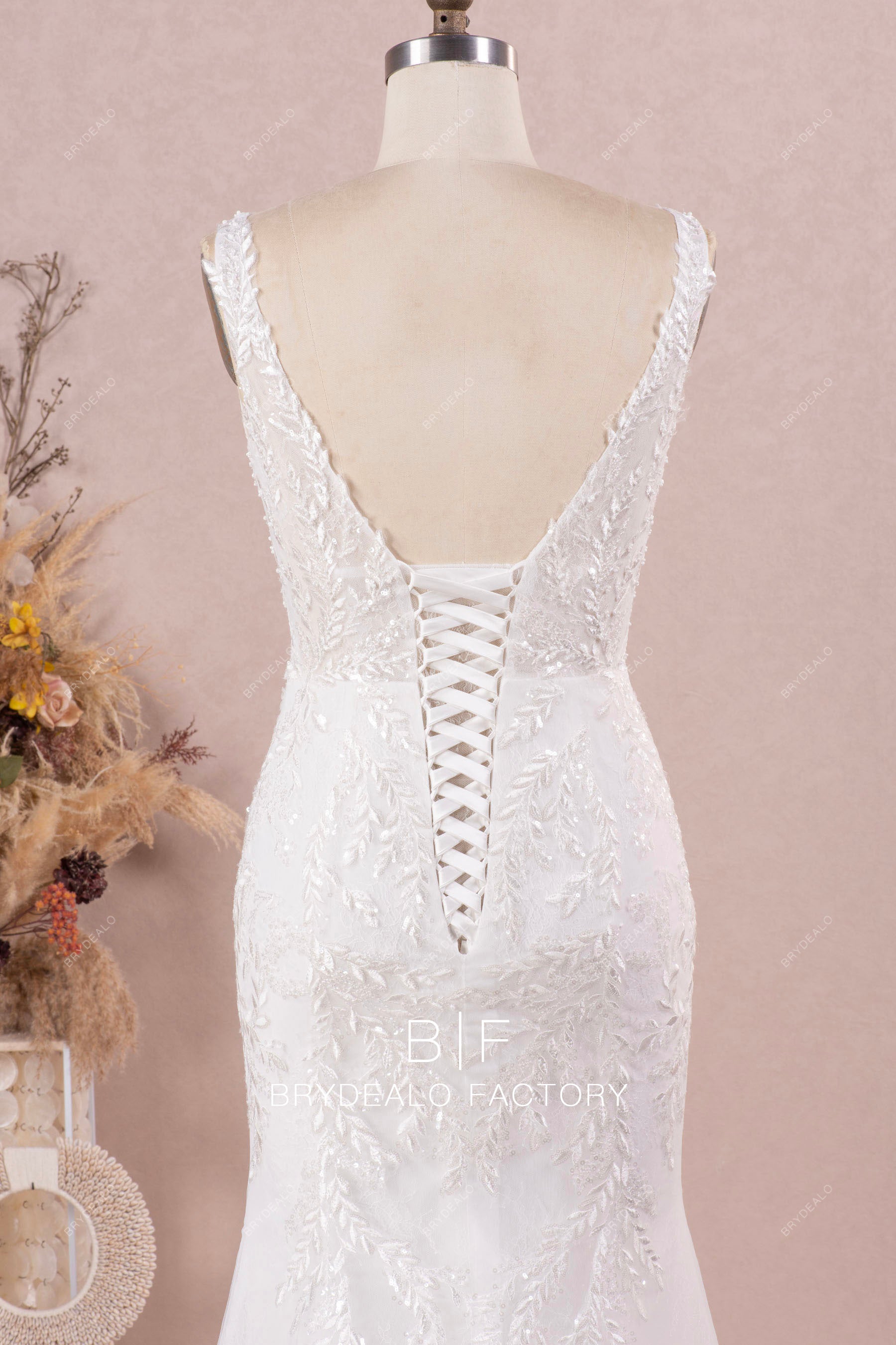 sleeveless lace up back wedding dress