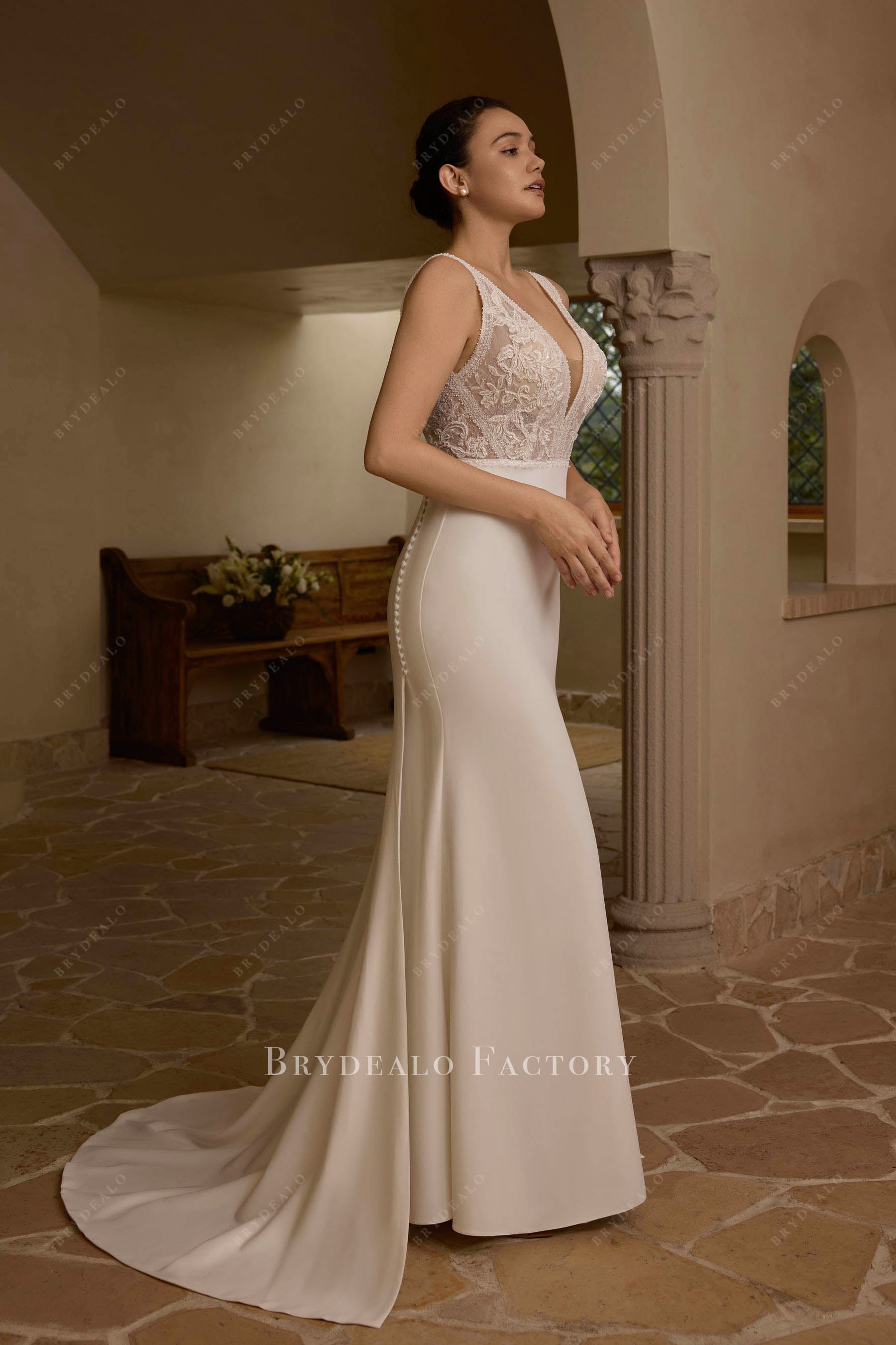 sleeveless overskirt crepe wedding dress