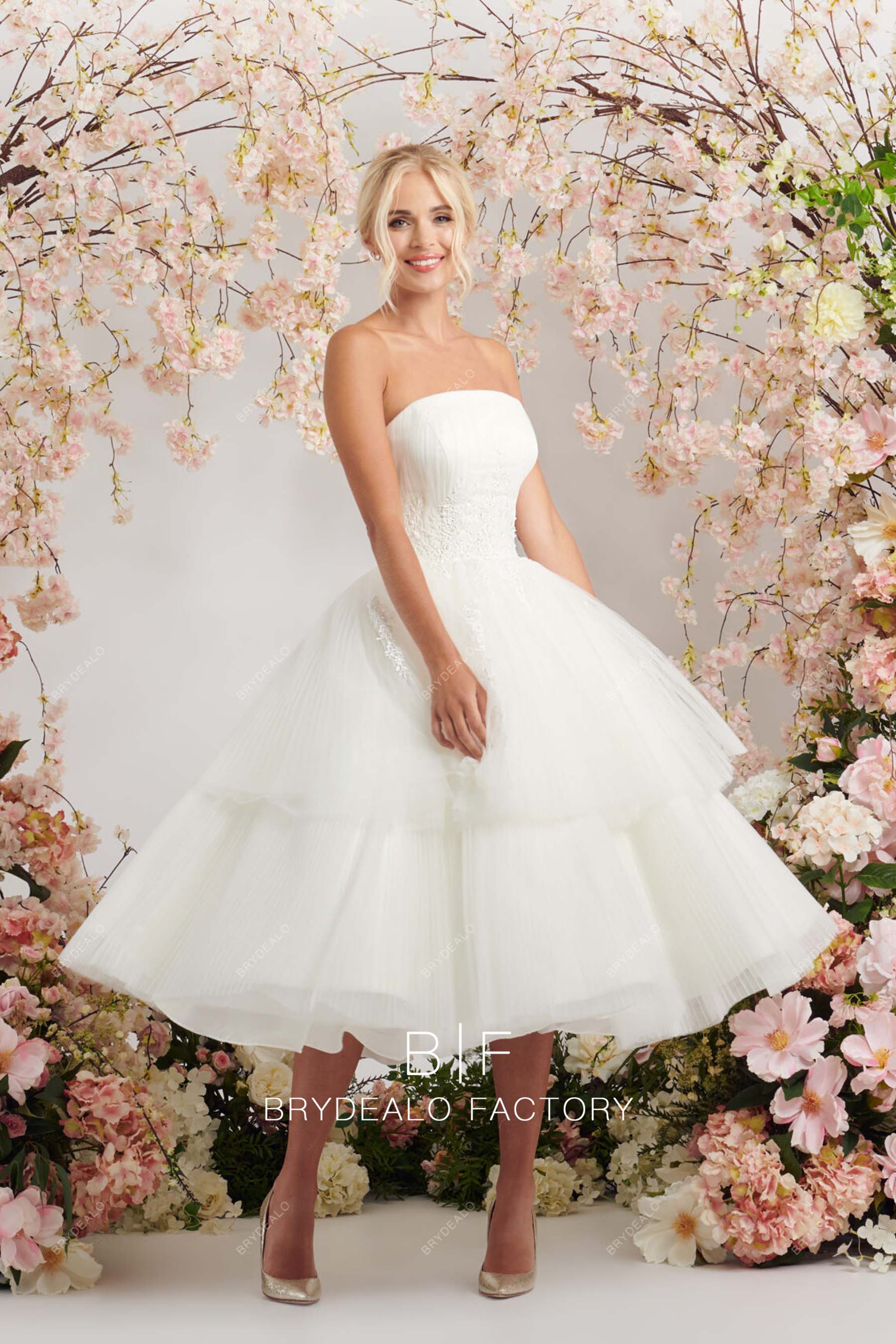 strapless tiered 1950s bridal dress