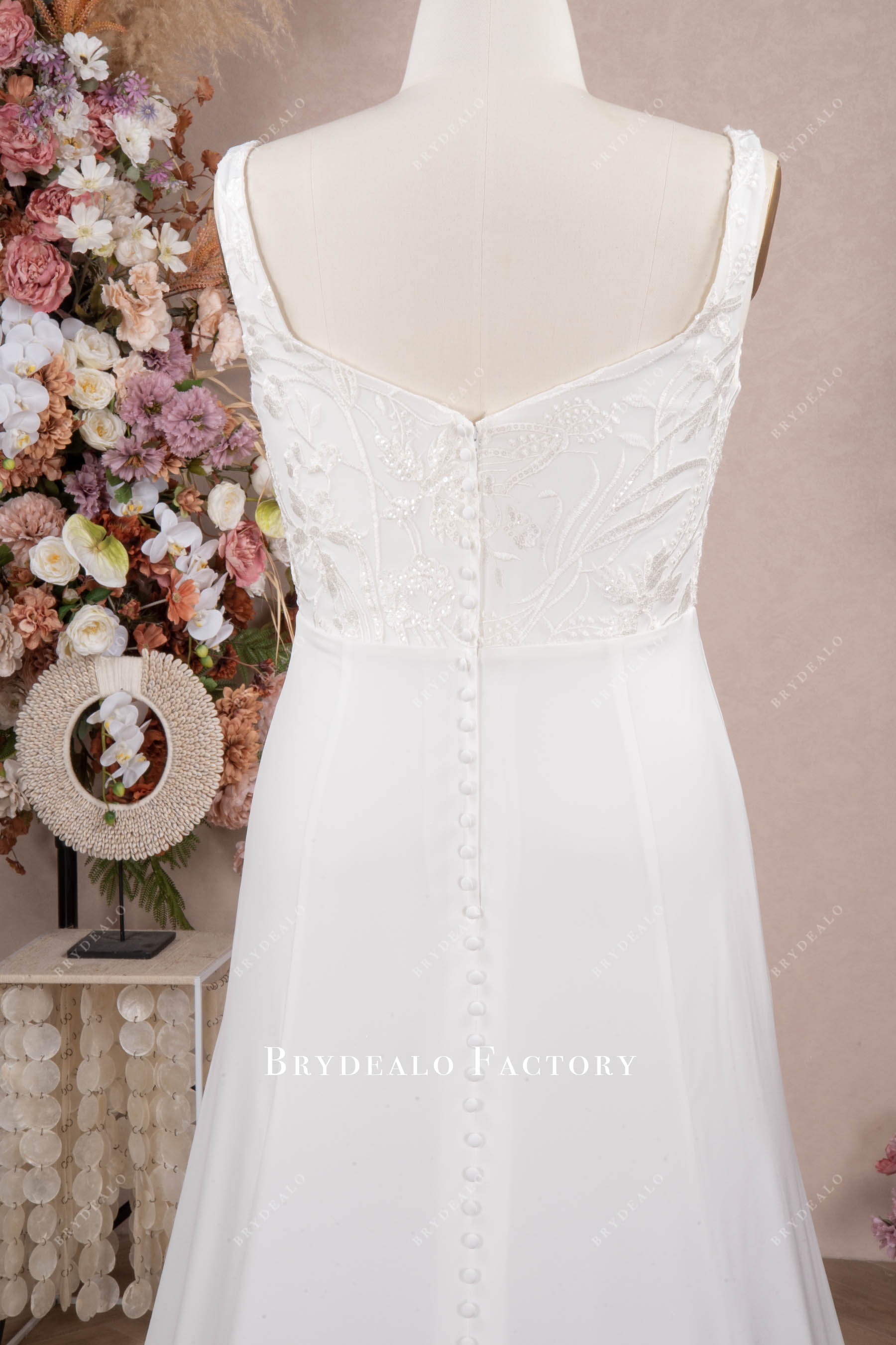 straps buttoned back wedding dress