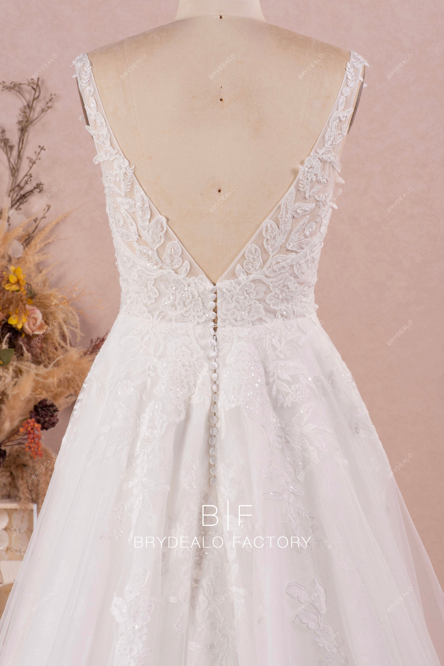 straps open buttoned back wedding dress