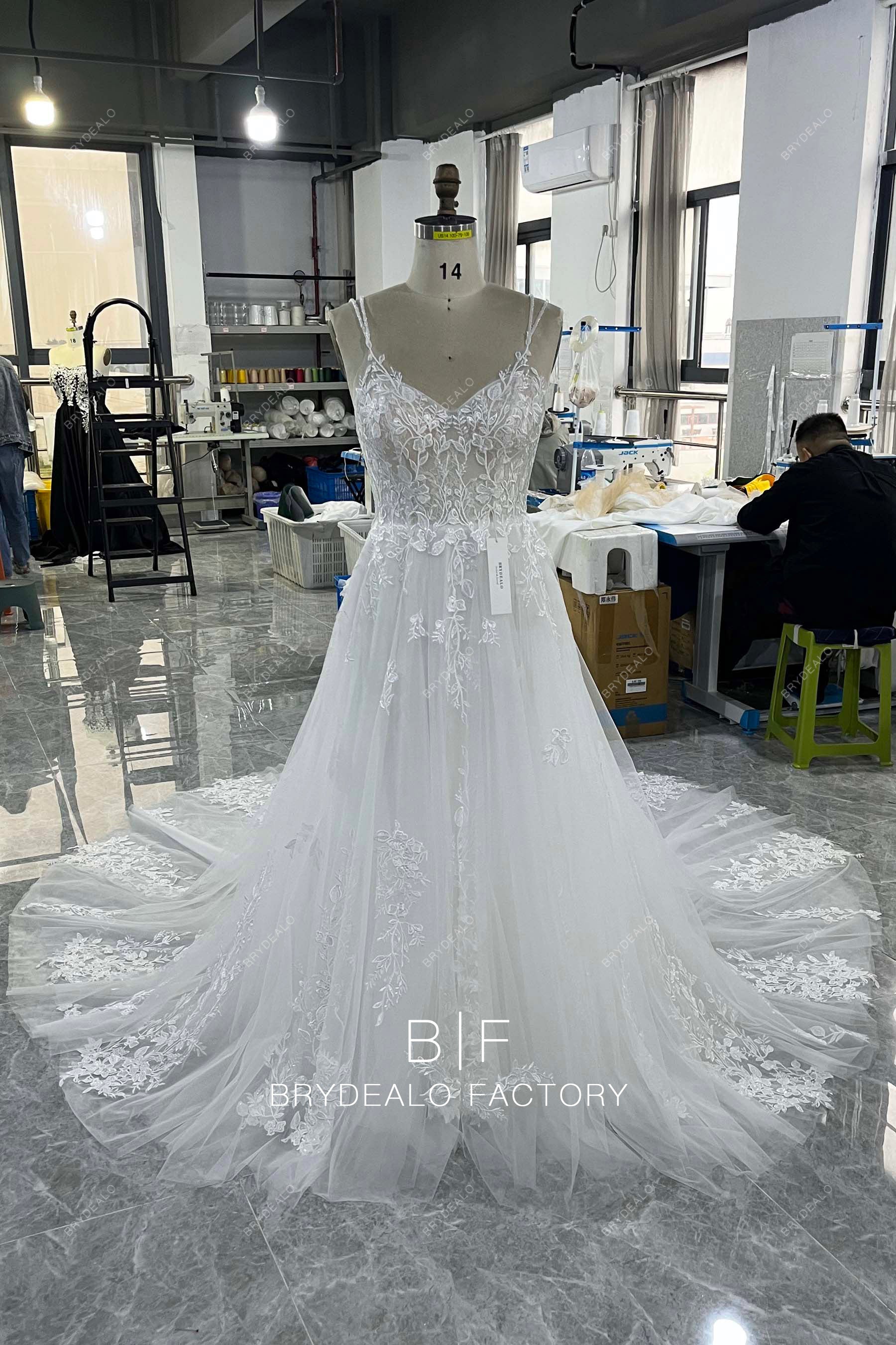 tailor-made straps A-line wedding gown