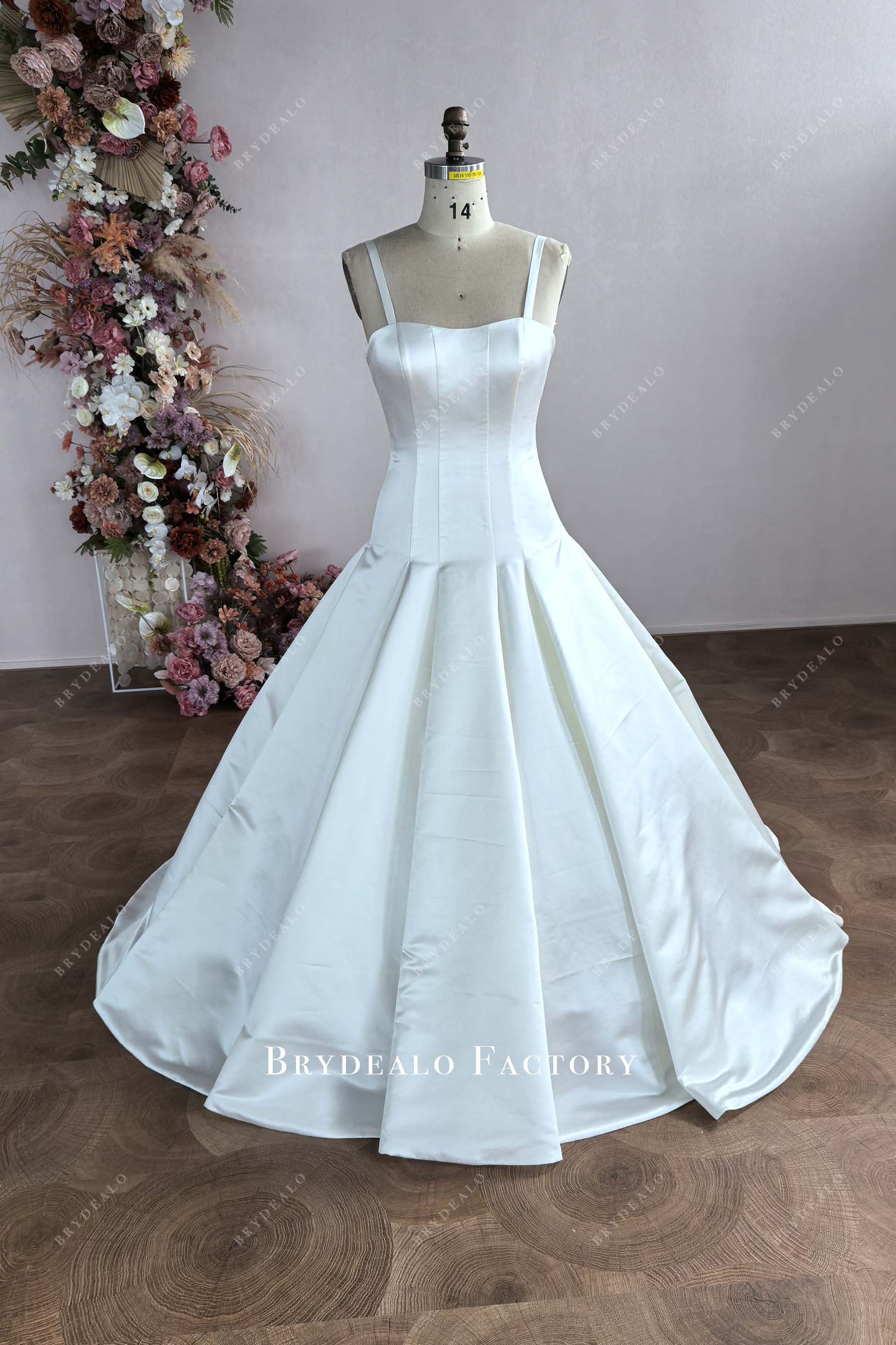 tailored ivory satin sleeveless wedding dress