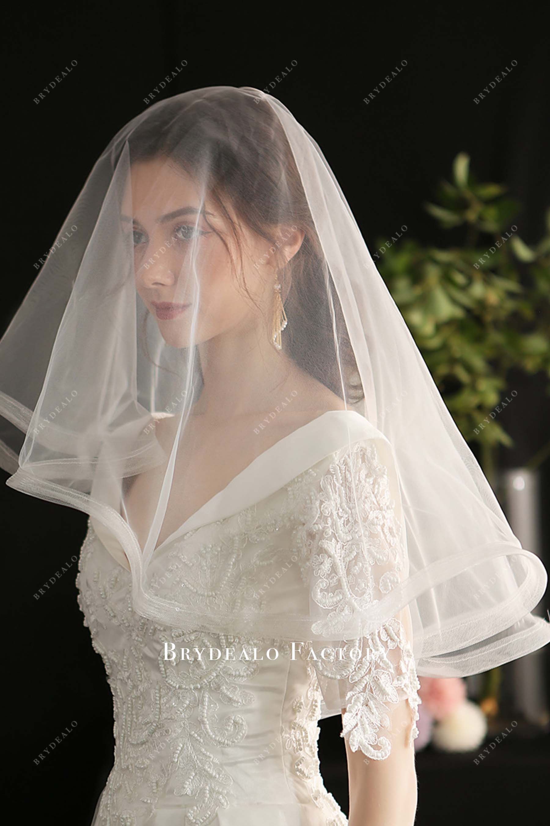 two tier tulle with comb bridal veil