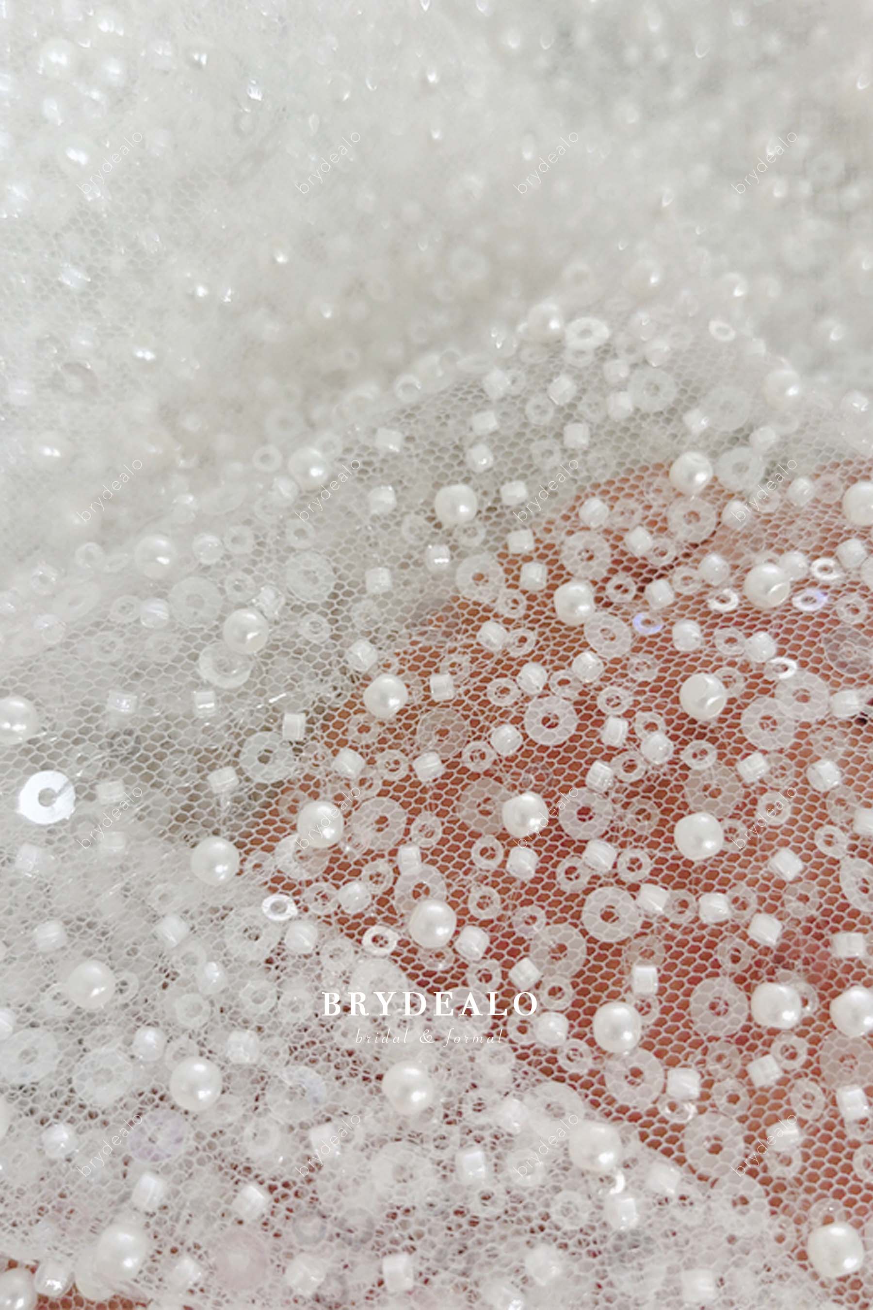 white beaded lace fabric